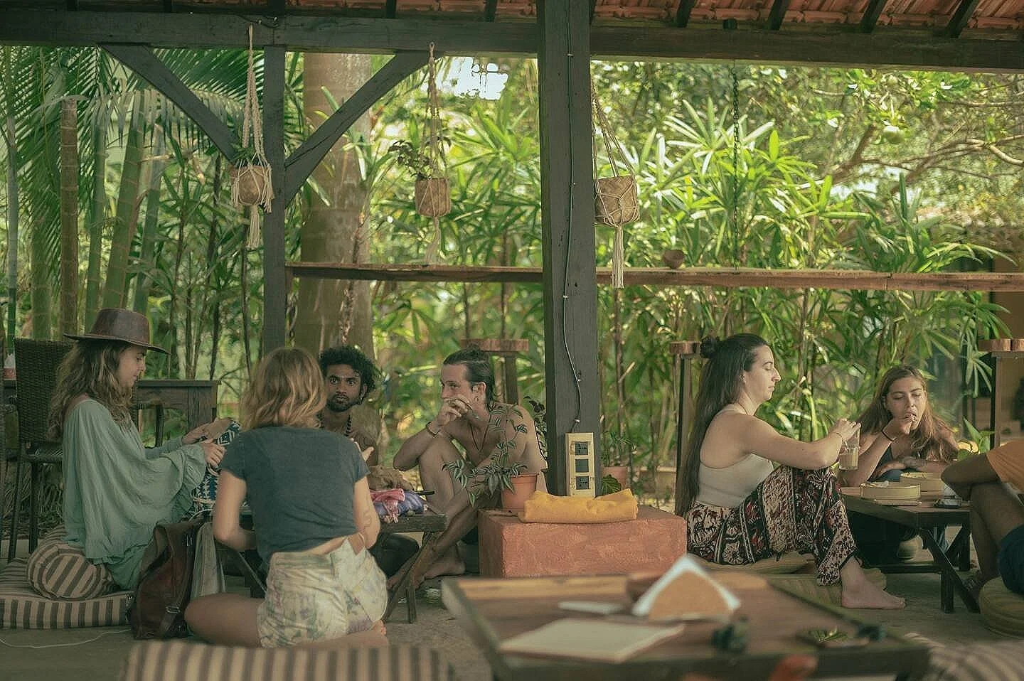 yoga community dancing on Goa beach during retreat