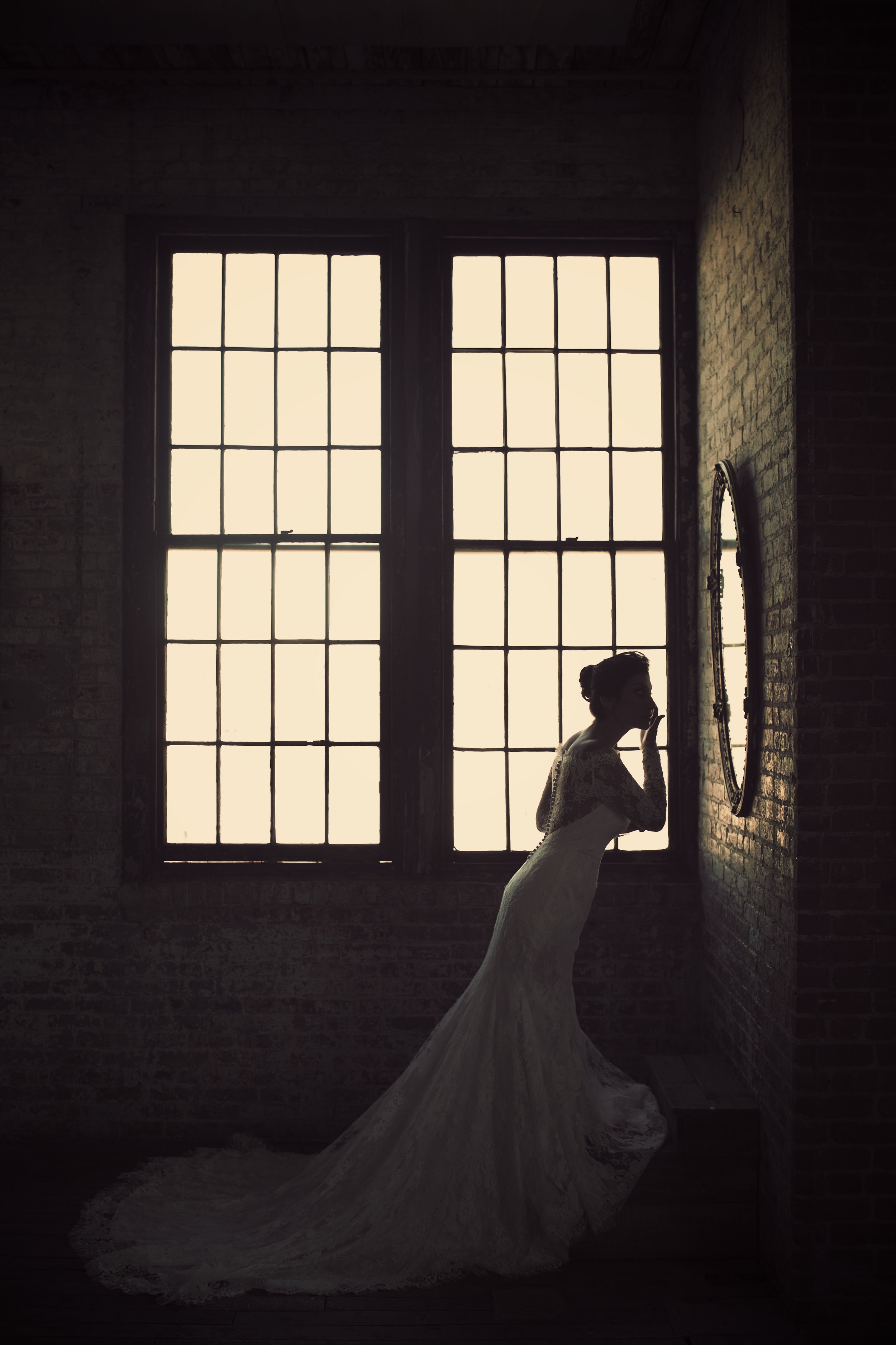 bride checking makeup in mirror NYC