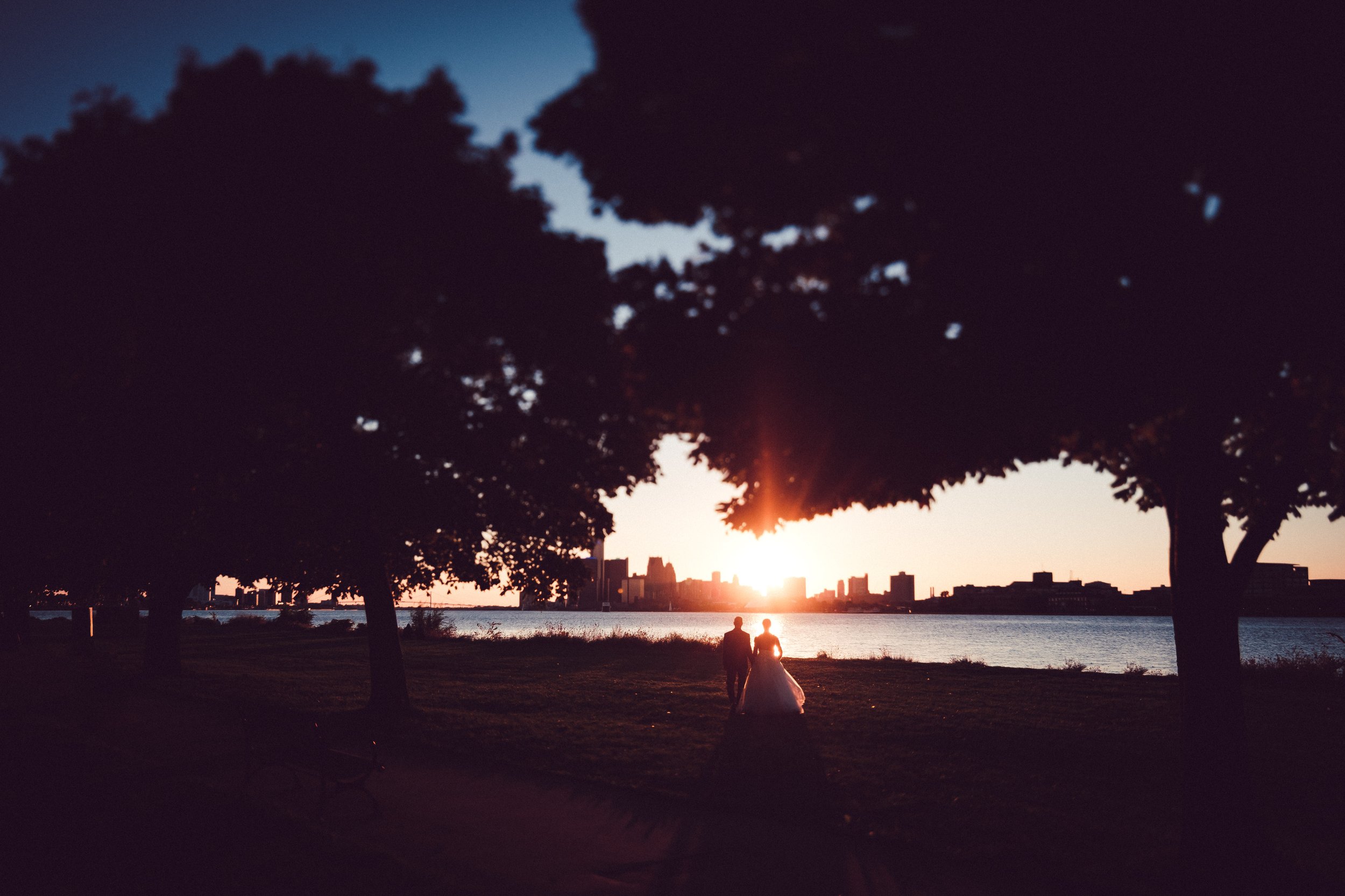 Detroit skyline from belle isle, sunset Detroit River