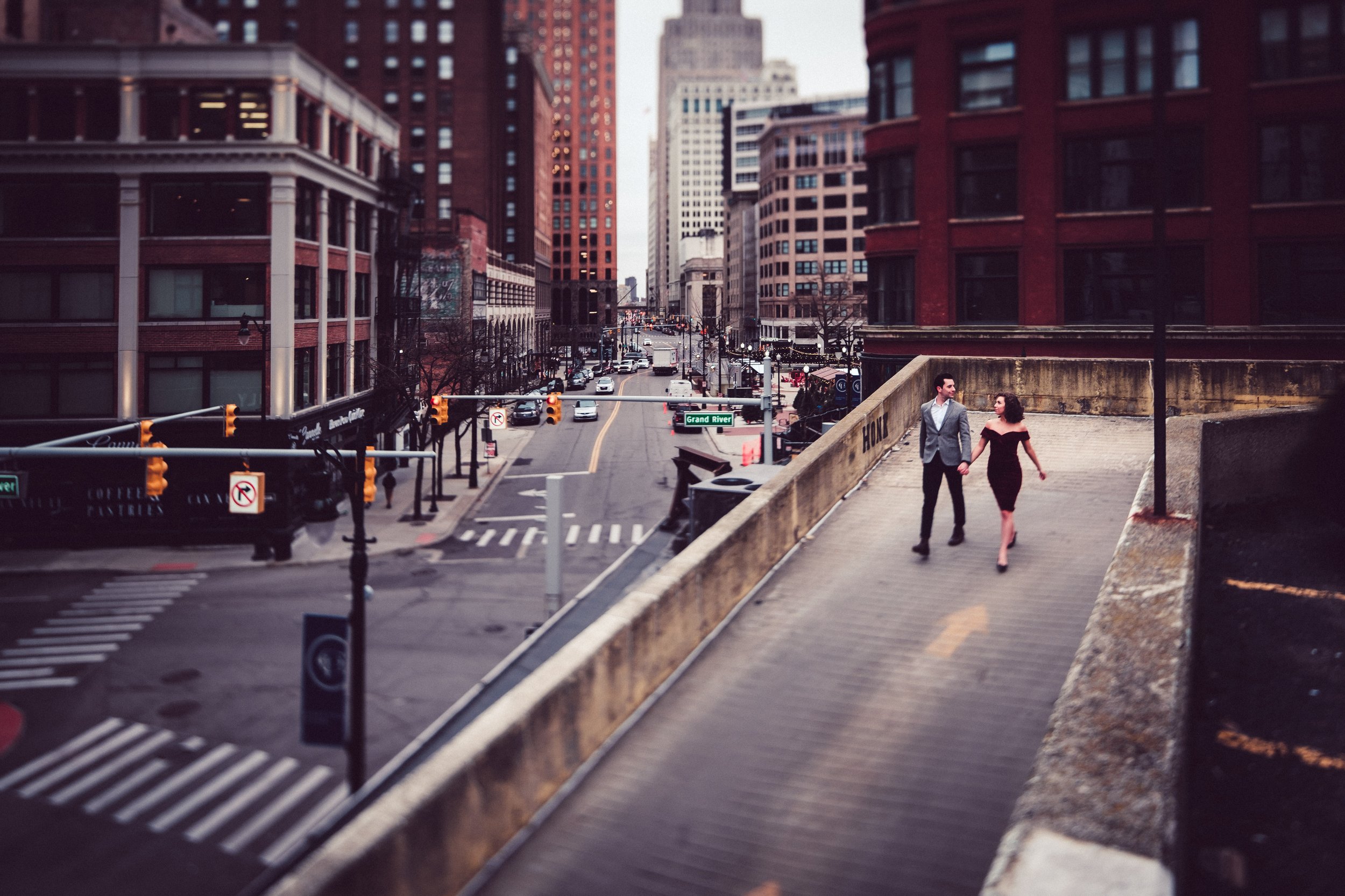Detroit urban cityscape couple walking