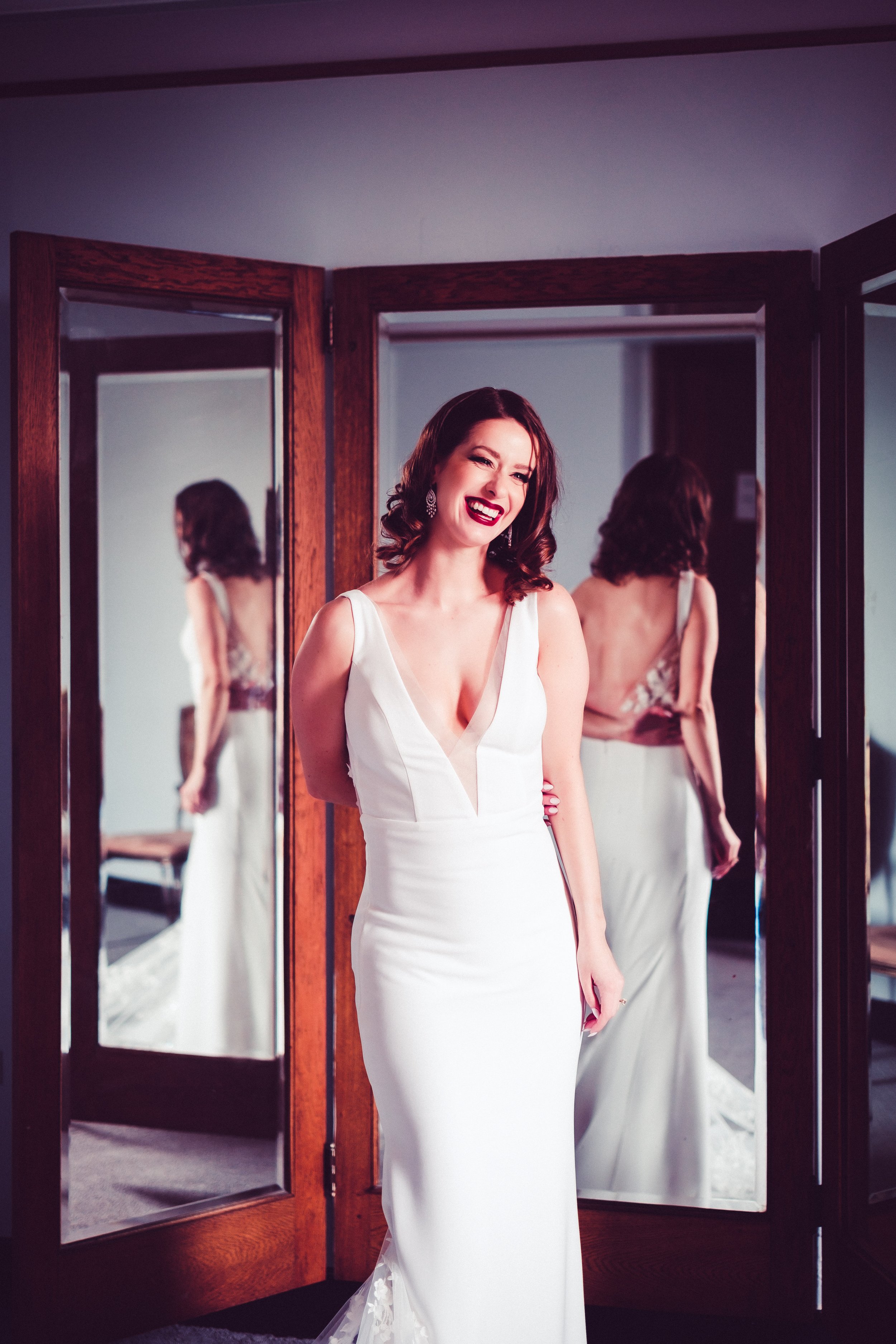 happy bride with 3 mirrors