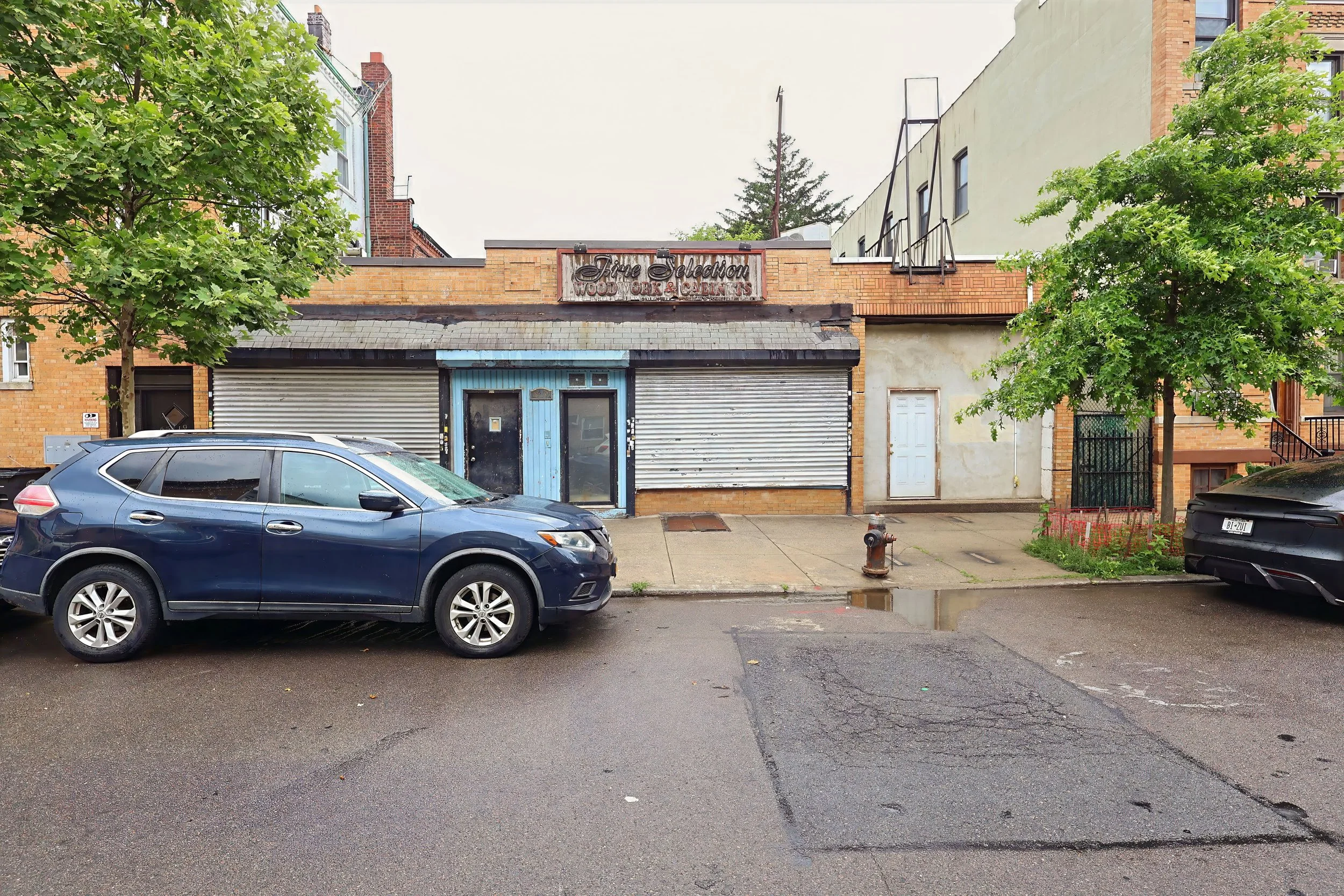 24 - 65-19 Myrtle Avenue Storefront Smaller.jpg