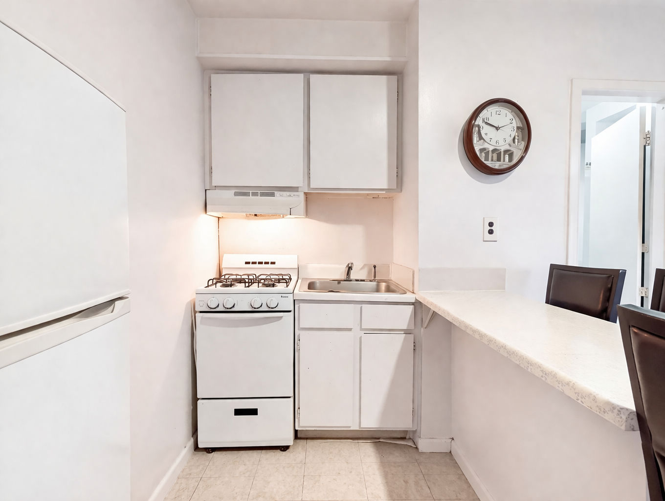 Bright minimalist kitchen with dining area.png