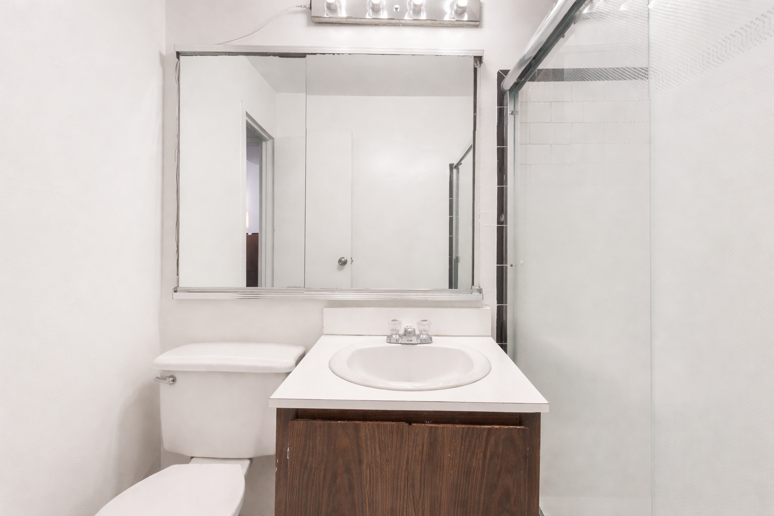 Minimalist bathroom with sleek vanity.png