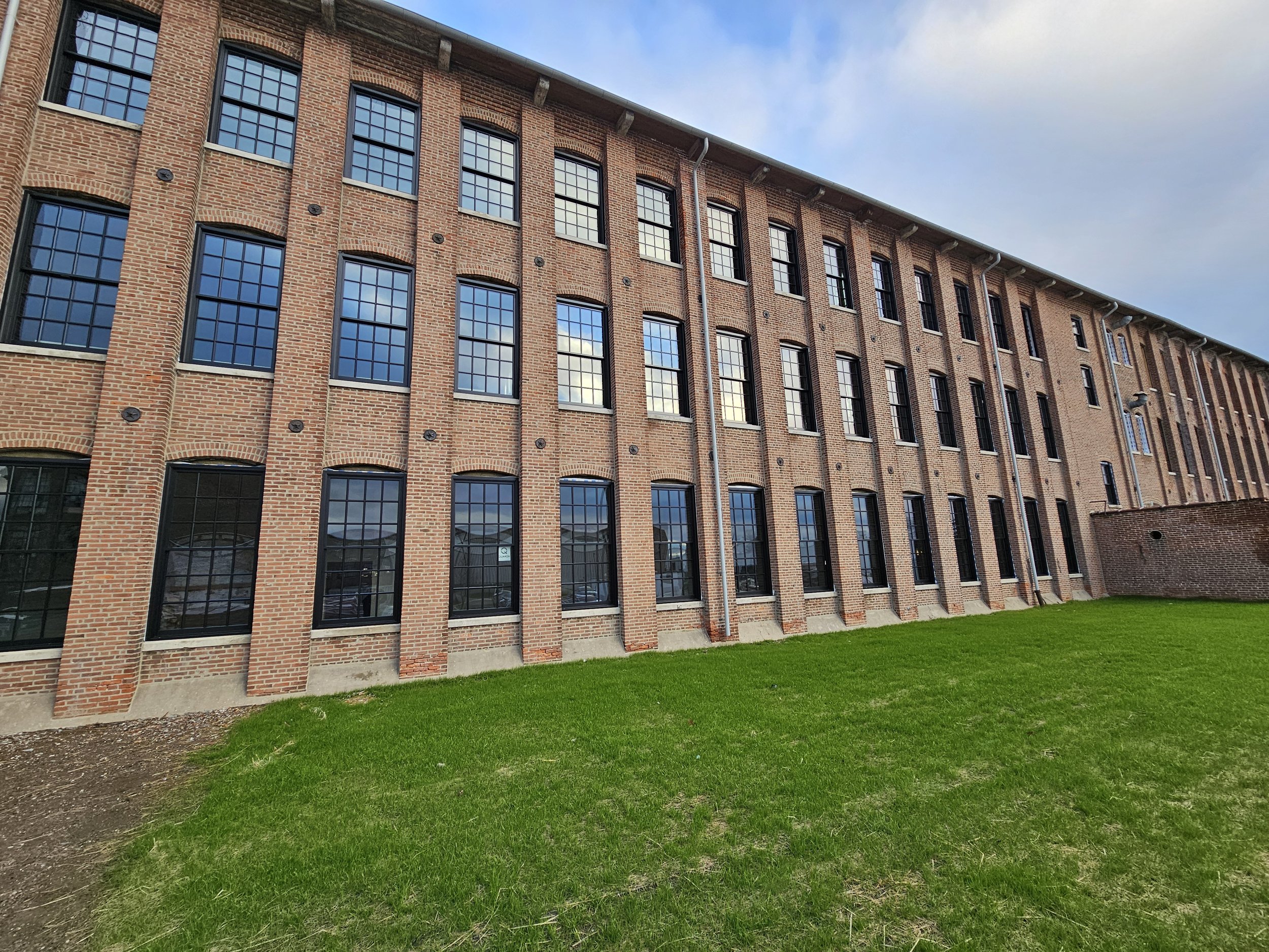 Mill 1 rear with windows, grass.jpg