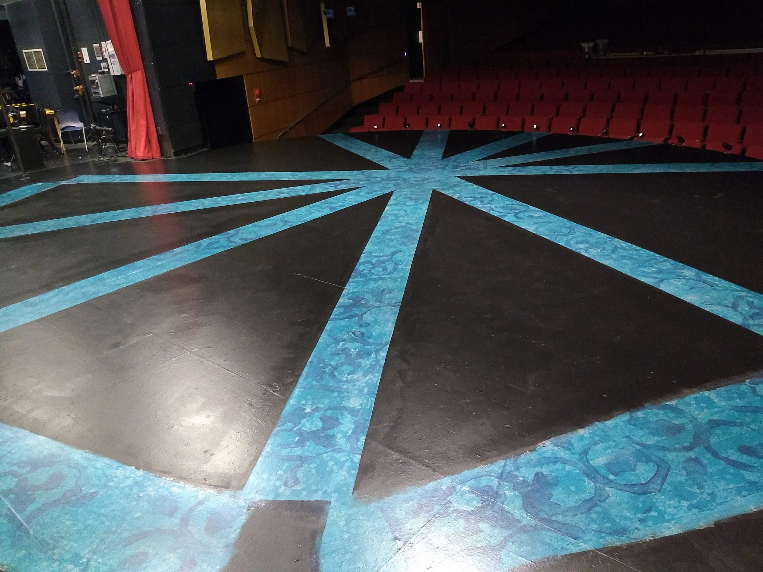 Painted stage floor for Pippin, American University, 2018. Set design: Jason Arnold.