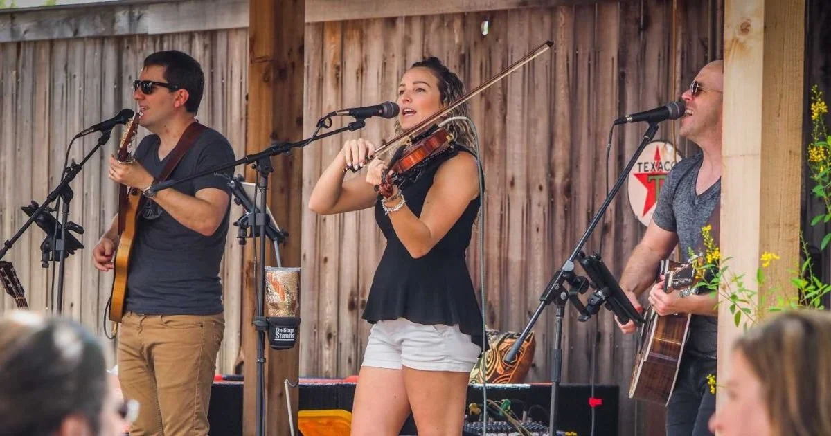 A group of musicians play in Fredericksburg, Texas. Photo credit to Fredericksburg CVB