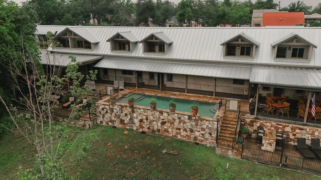 An aerial view of the pool and patio at the Winchester Lodge. Photo by Anna Haile Photo.