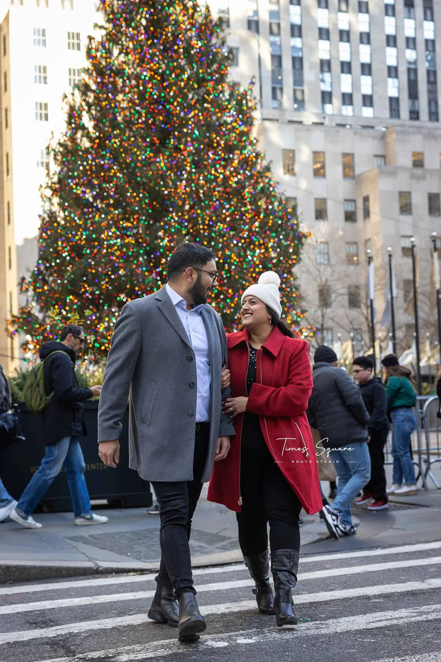 Capture your Christmas memories with a photoshoot at the most iconic holiday-decorated locations in New York City, including Rockefeller Center, Radio City, and other festive spots.