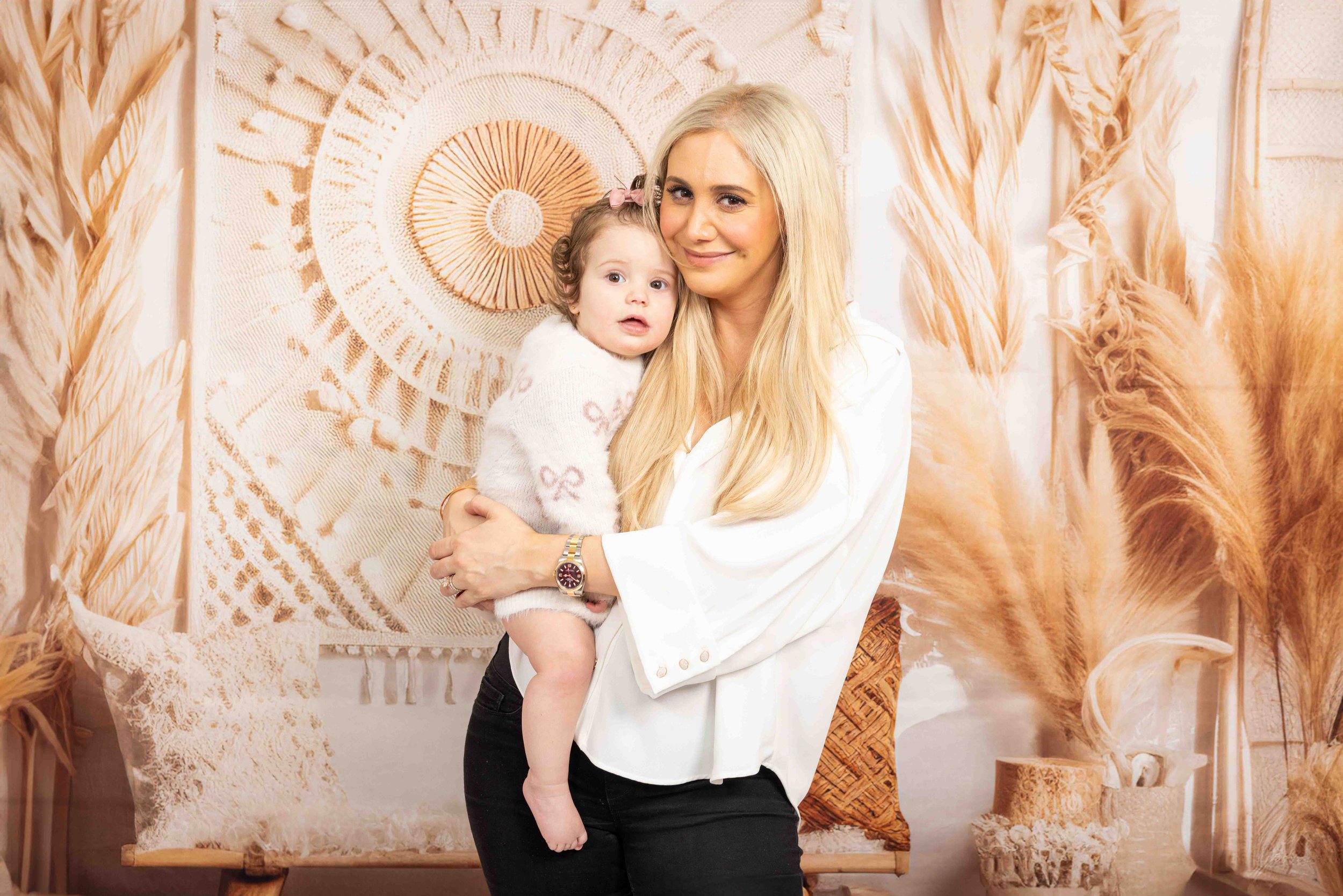 studio portraits, maternity, lifestyle, vacation, and commercial sessions. Whether you want a timeless studio look or iconic NYC backdrops, we capture stunning images you'll cherish forever.