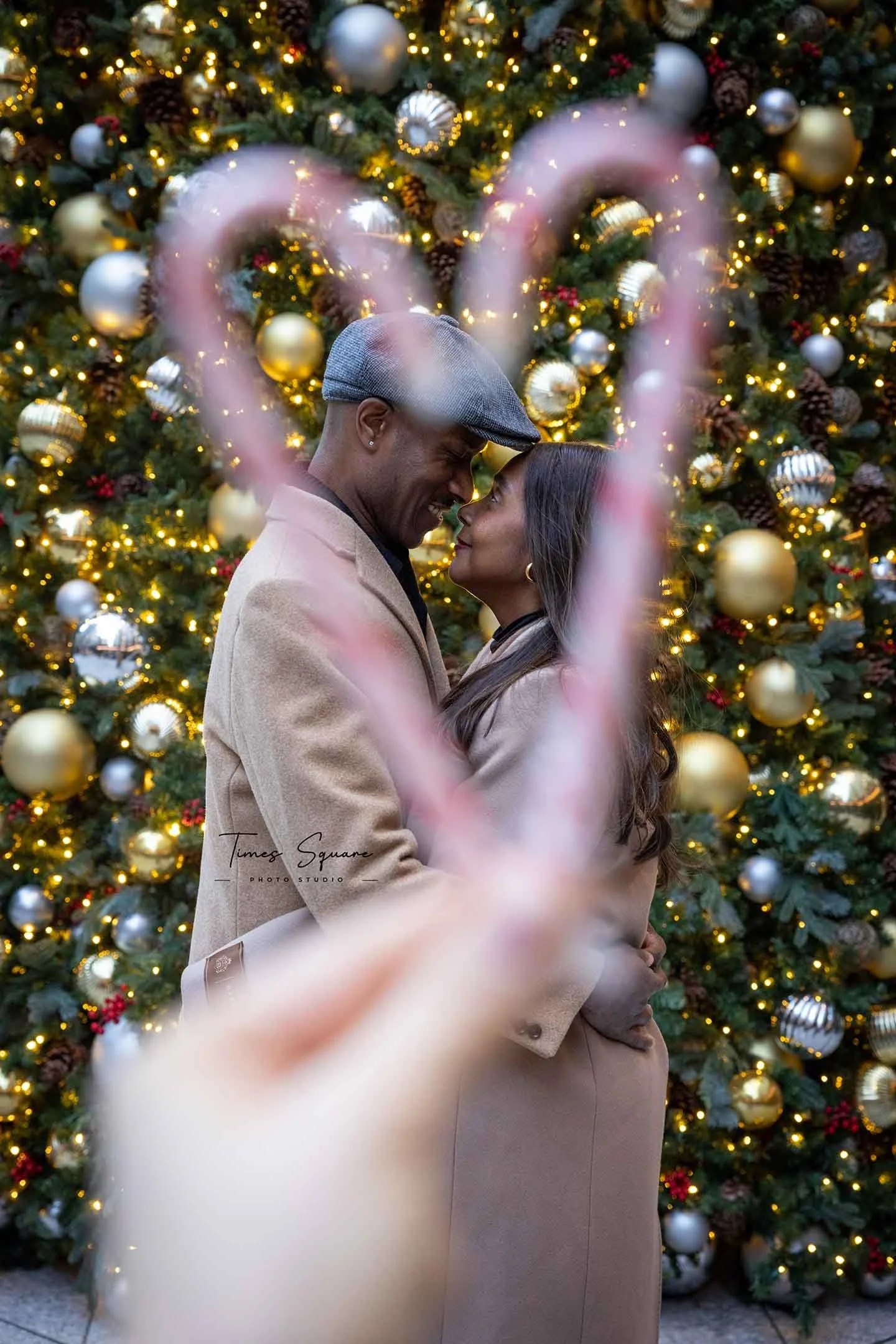 Capture your Christmas memories with a photoshoot at the most iconic holiday-decorated locations in New York City, including Rockefeller Center, Radio City, and other festive spots.