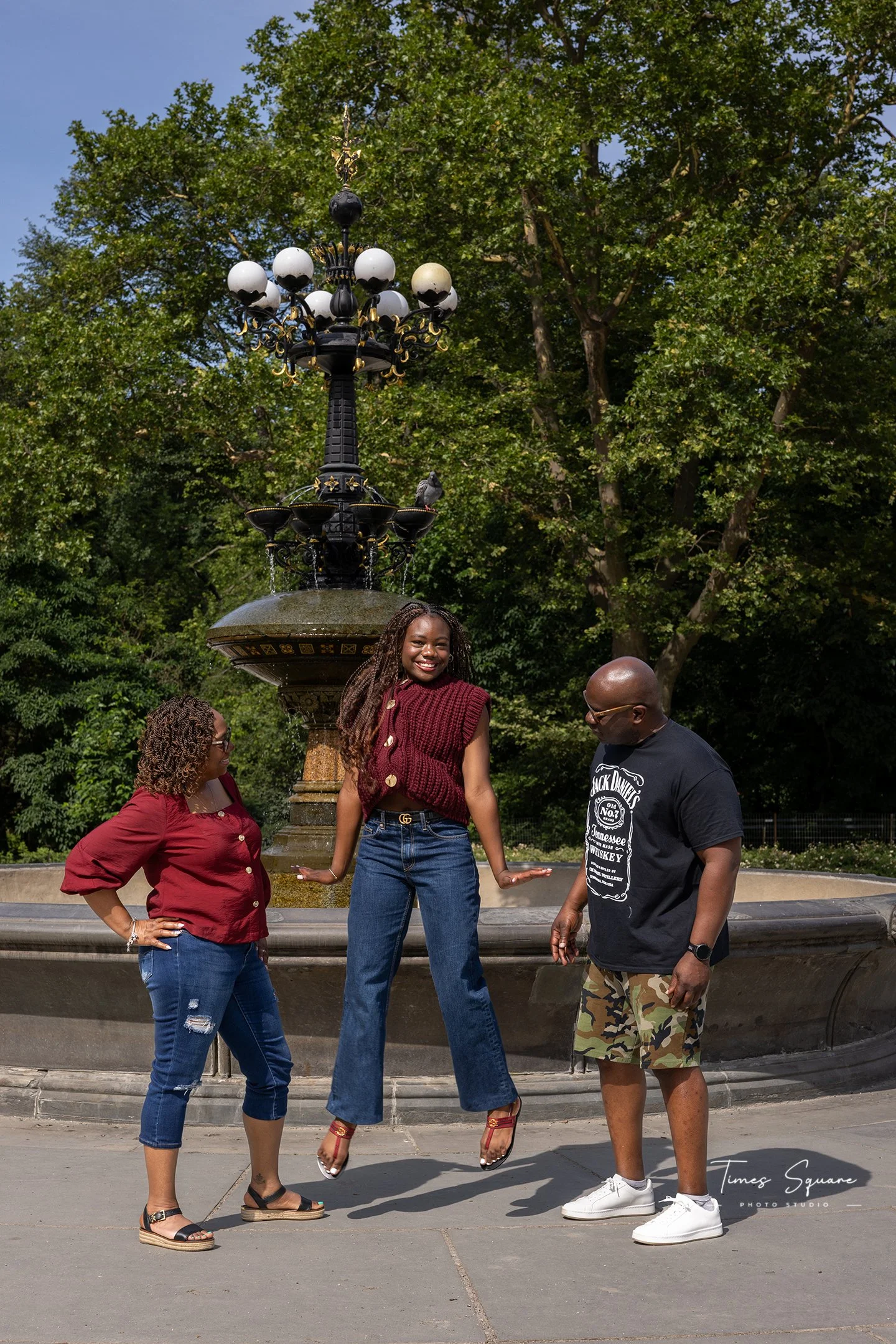 Central Park graduation portraits in NYC, celebrating milestones with family and lifestyle photography.