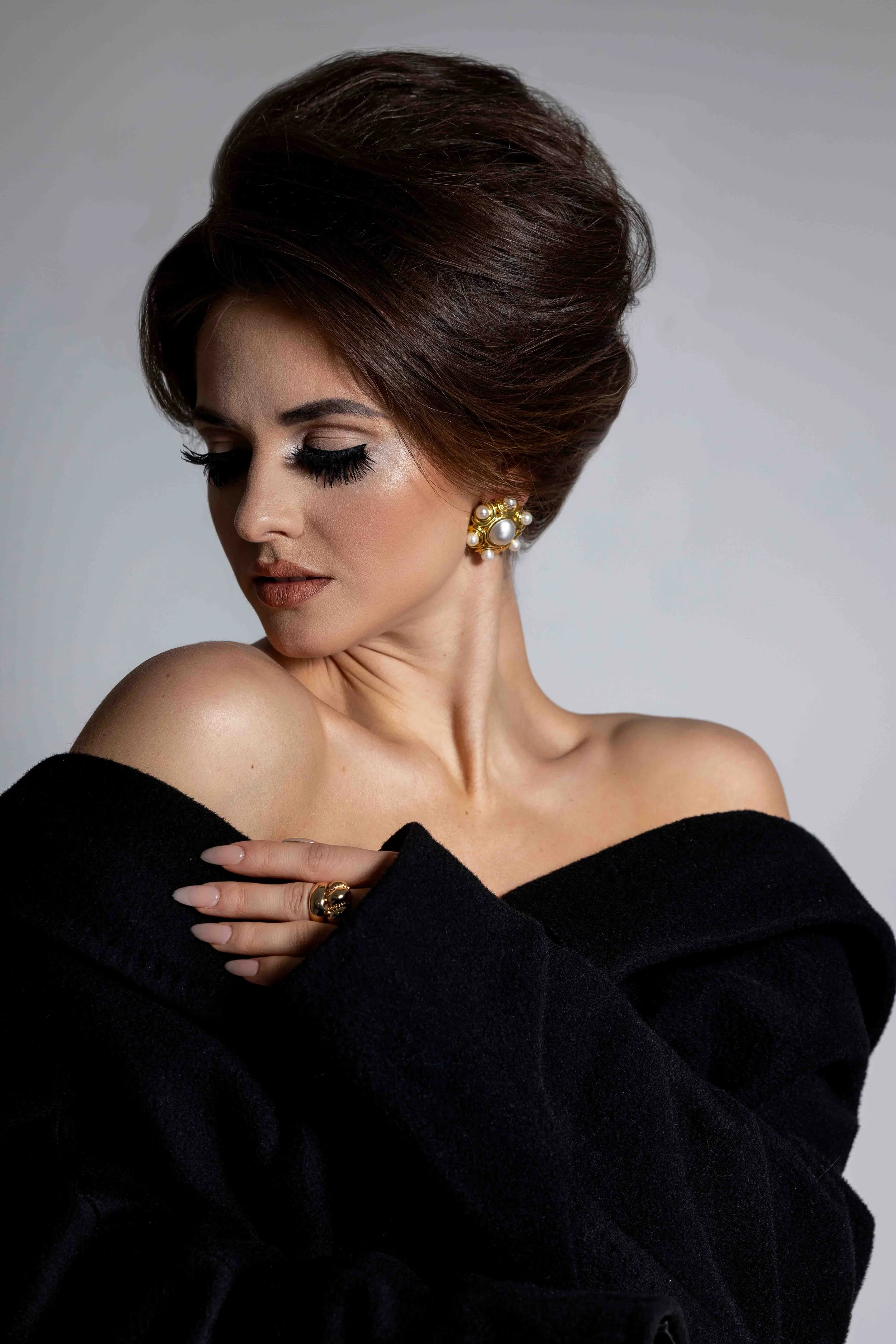 studio portraits, maternity, lifestyle, vacation, and commercial sessions. Whether you want a timeless studio look or iconic NYC backdrops, we capture stunning images you'll cherish forever.