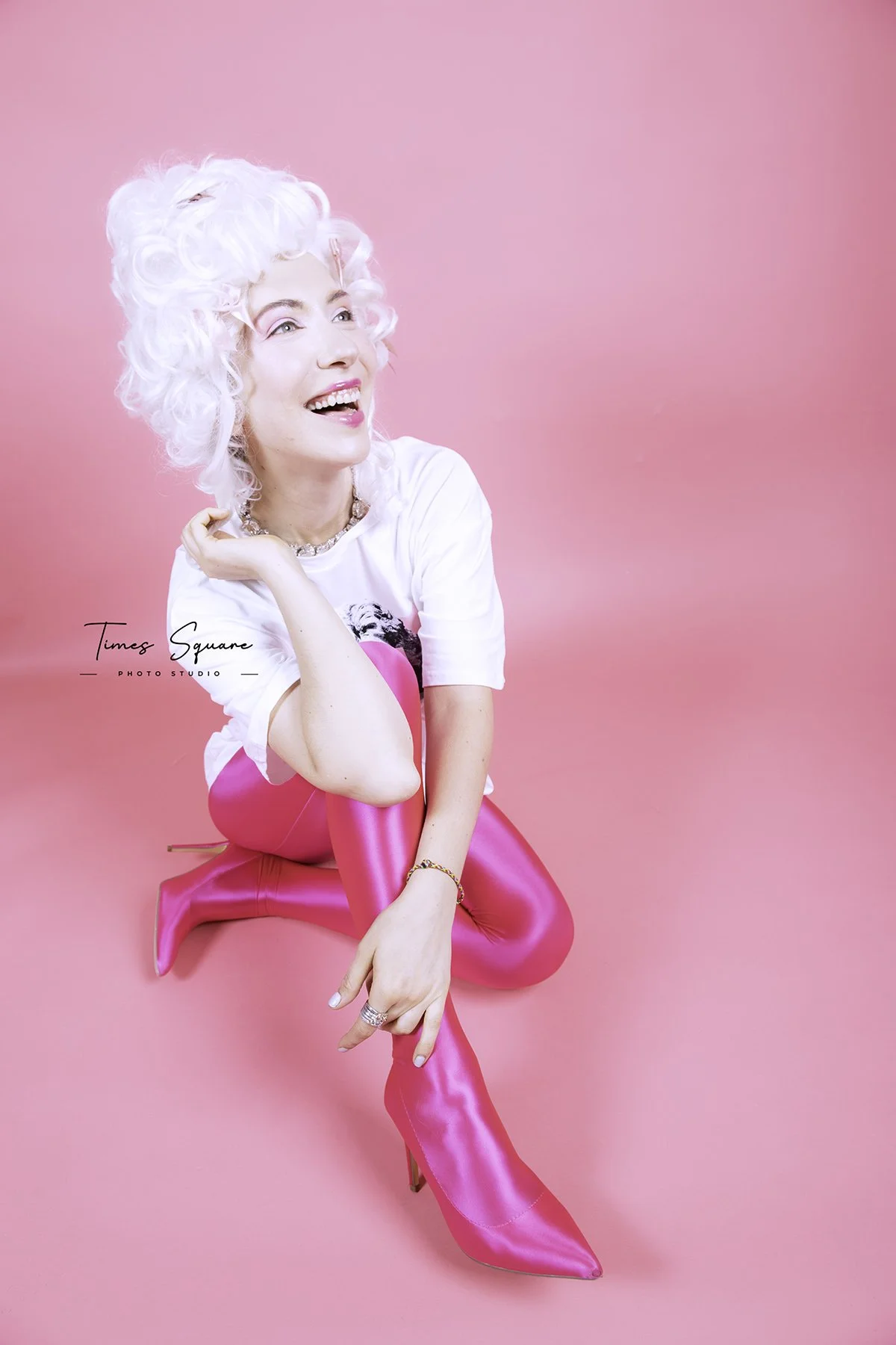 a woman wearing Antoinette - inspired outfit for her birthday studio photoshoot in New York City