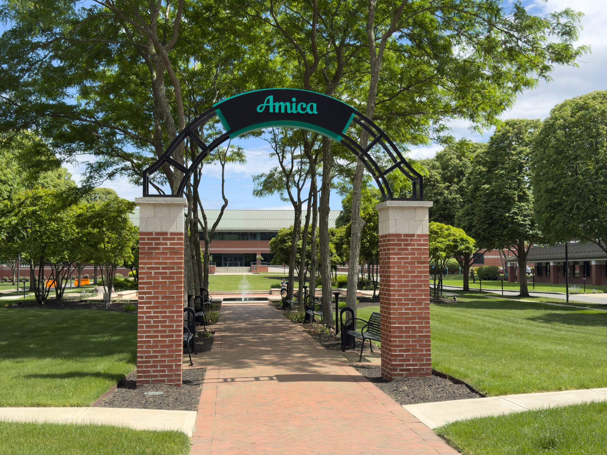 View of the Amica Arch Gateway sign on the Amica corporate campus