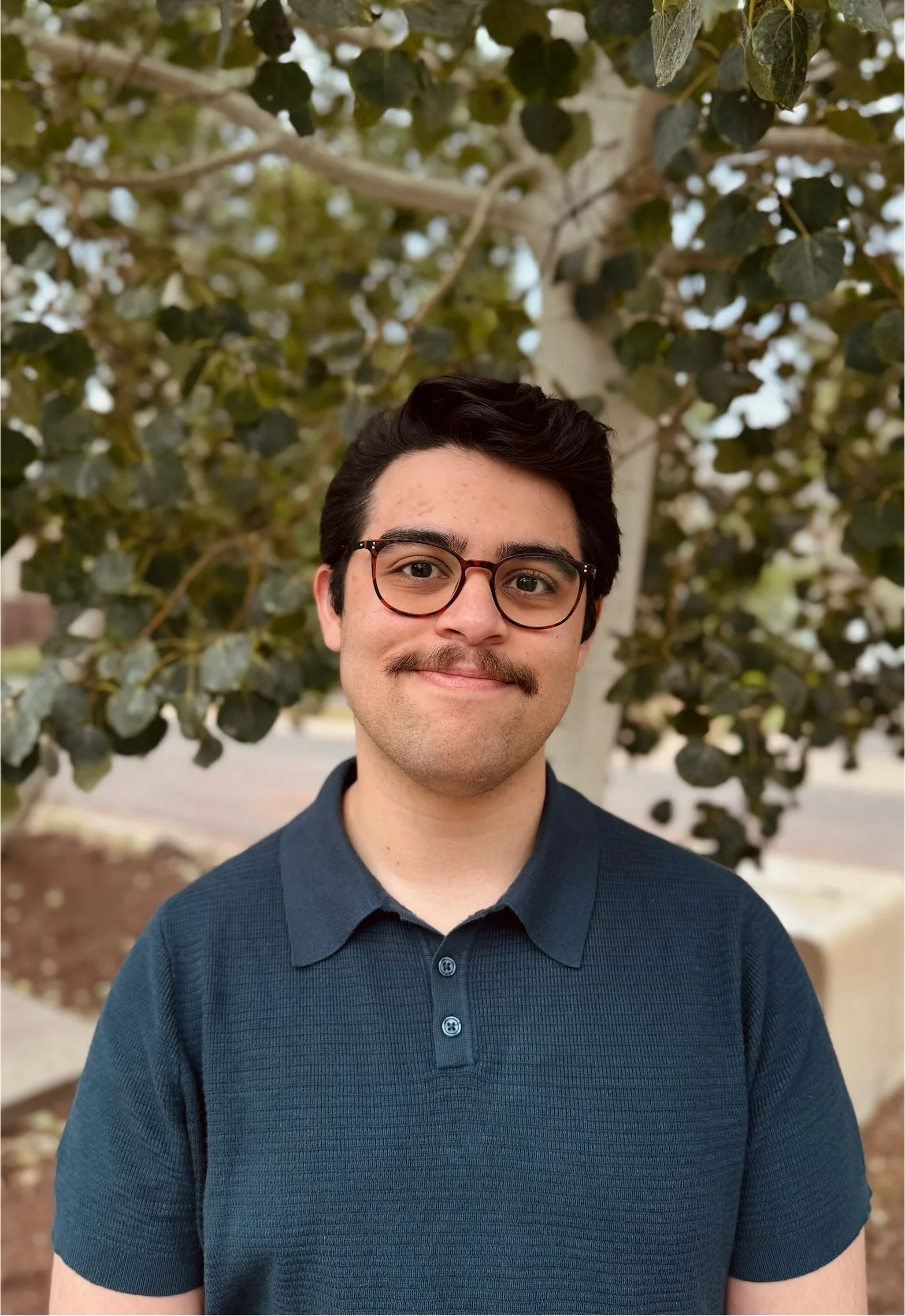 Adam Fajardo (he/they)