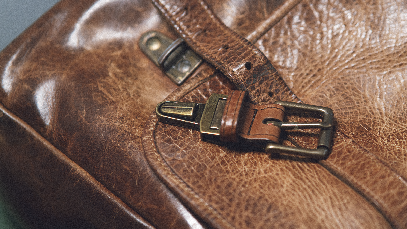 The removable buckle on an Ona Brixton camera bag.