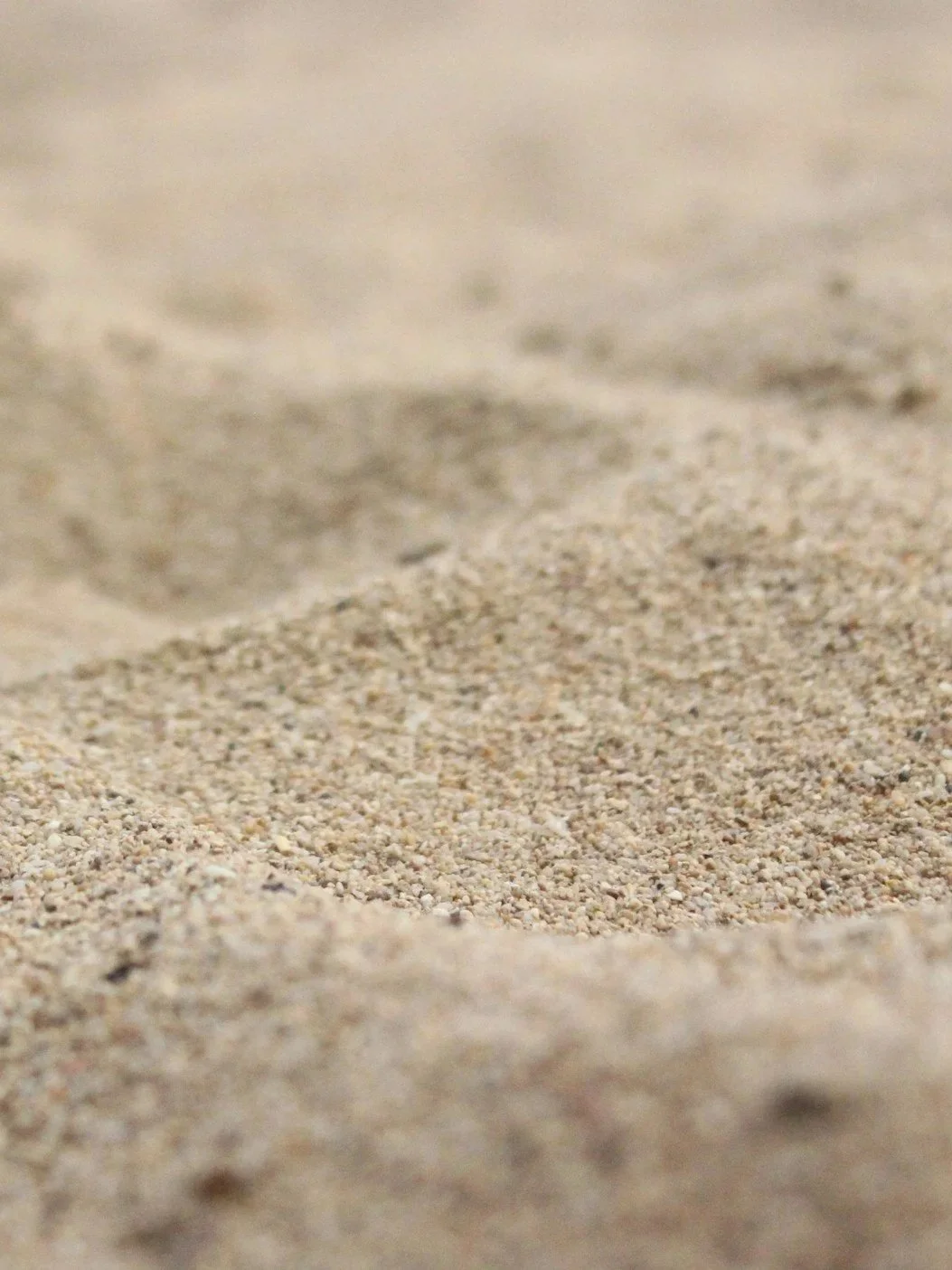 Sand gathered from a meaningful landscape, ready to be transformed into a custom gold heirloom through sentimental topography.