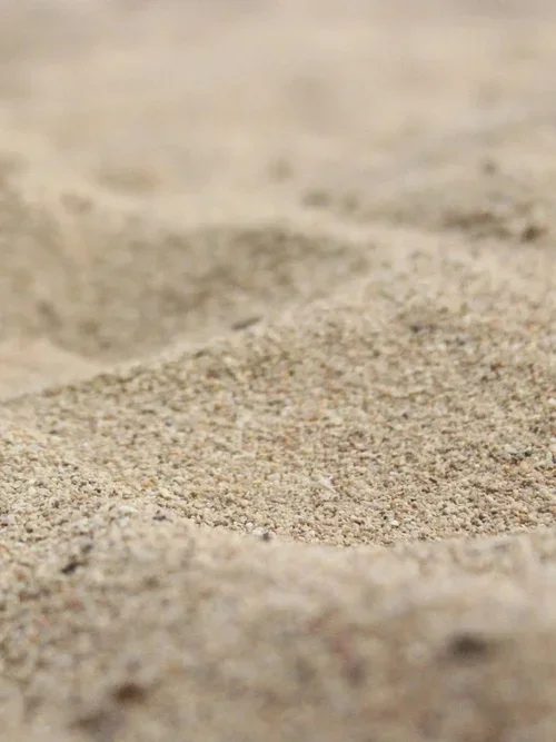 Sand gathered from a meaningful landscape, ready to be transformed into a custom gold heirloom through sentimental topography.