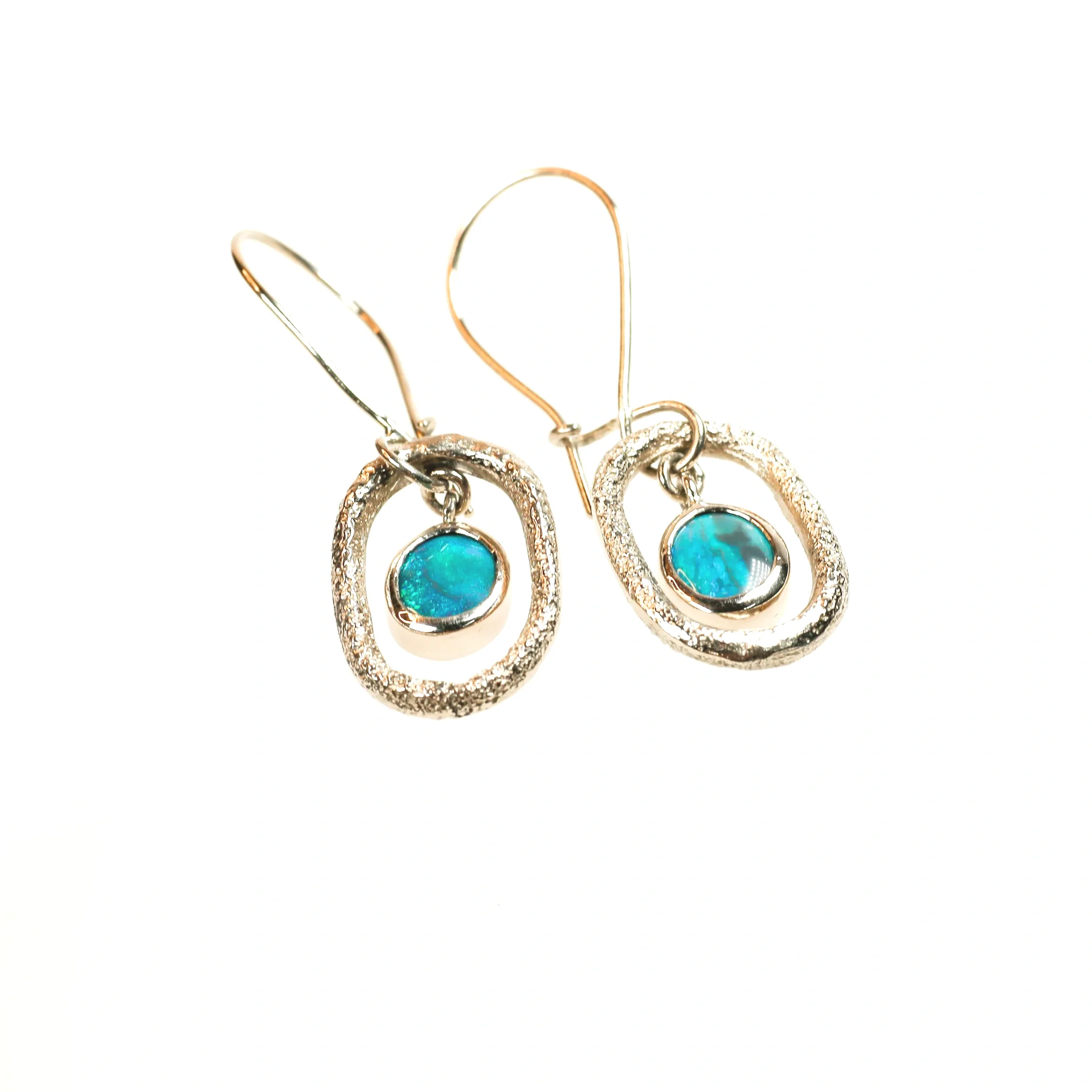 A pair of 18ct gold earrings with black opals, a commission made by Iain Sainsbury