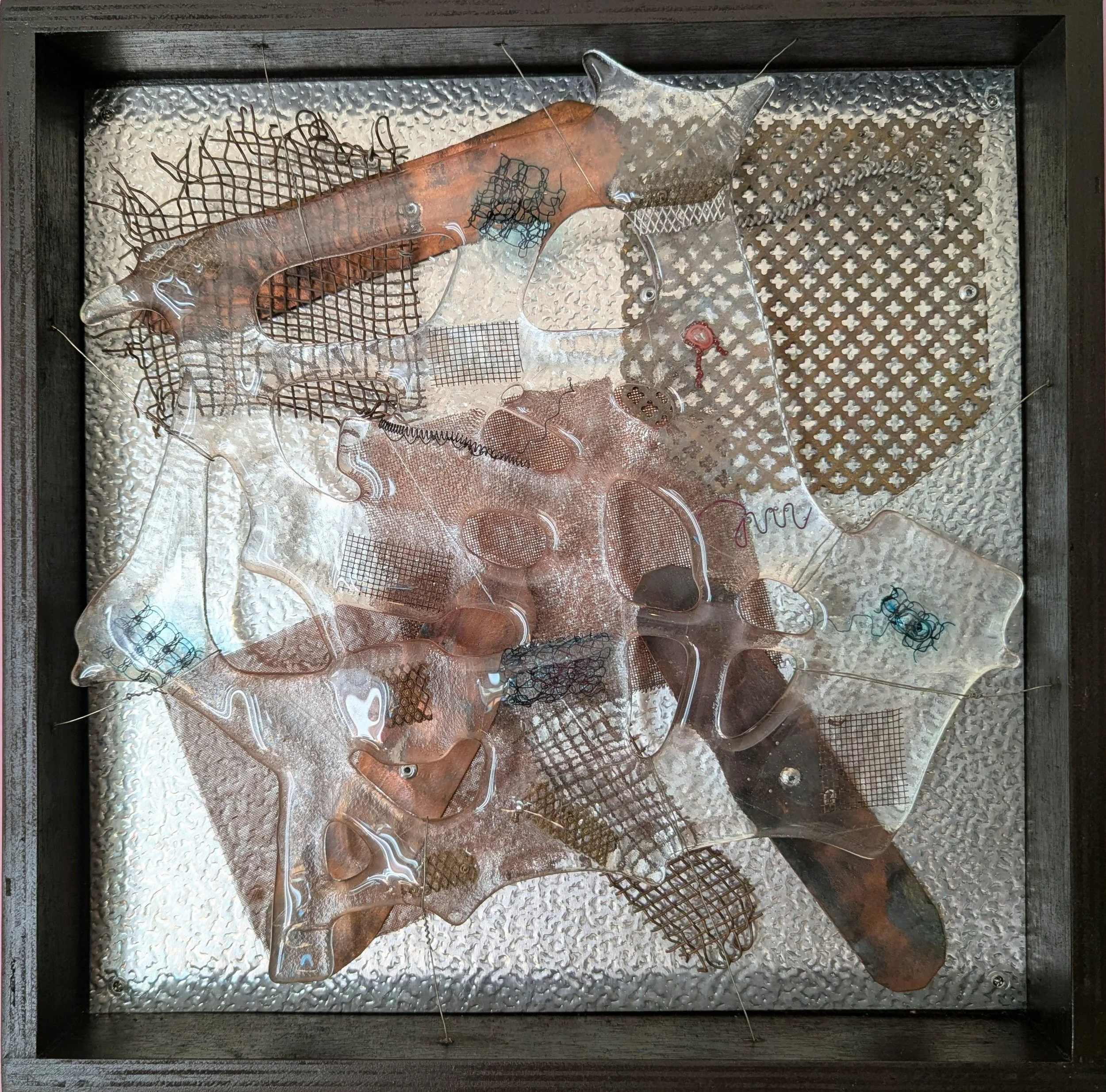 Behind Glass: Copper,
33x33x4cm, 2026.
Fused glass & found metal.