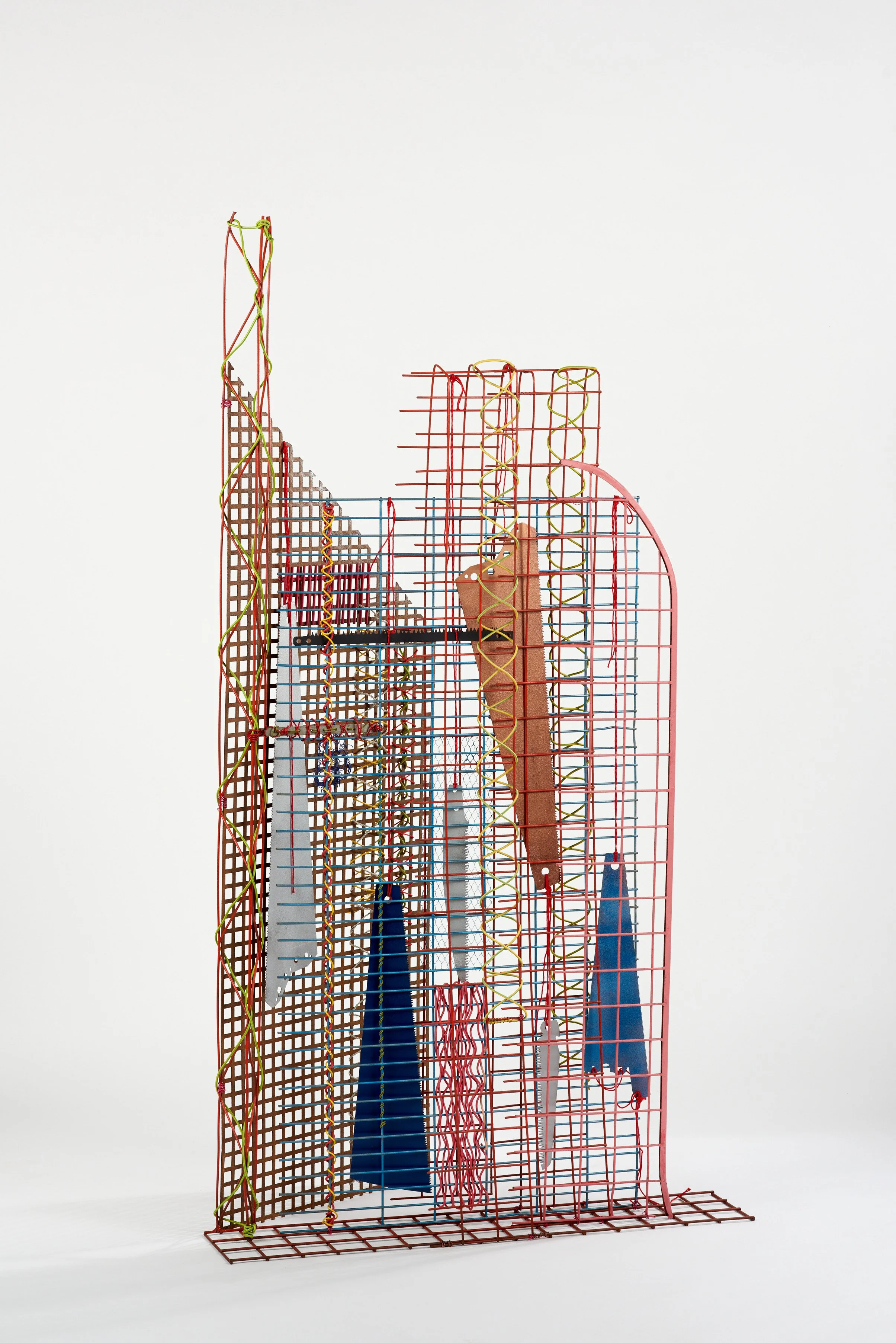 Sawscape, 2023, 140x64x35, salvaged metal grid, saws cable and cord