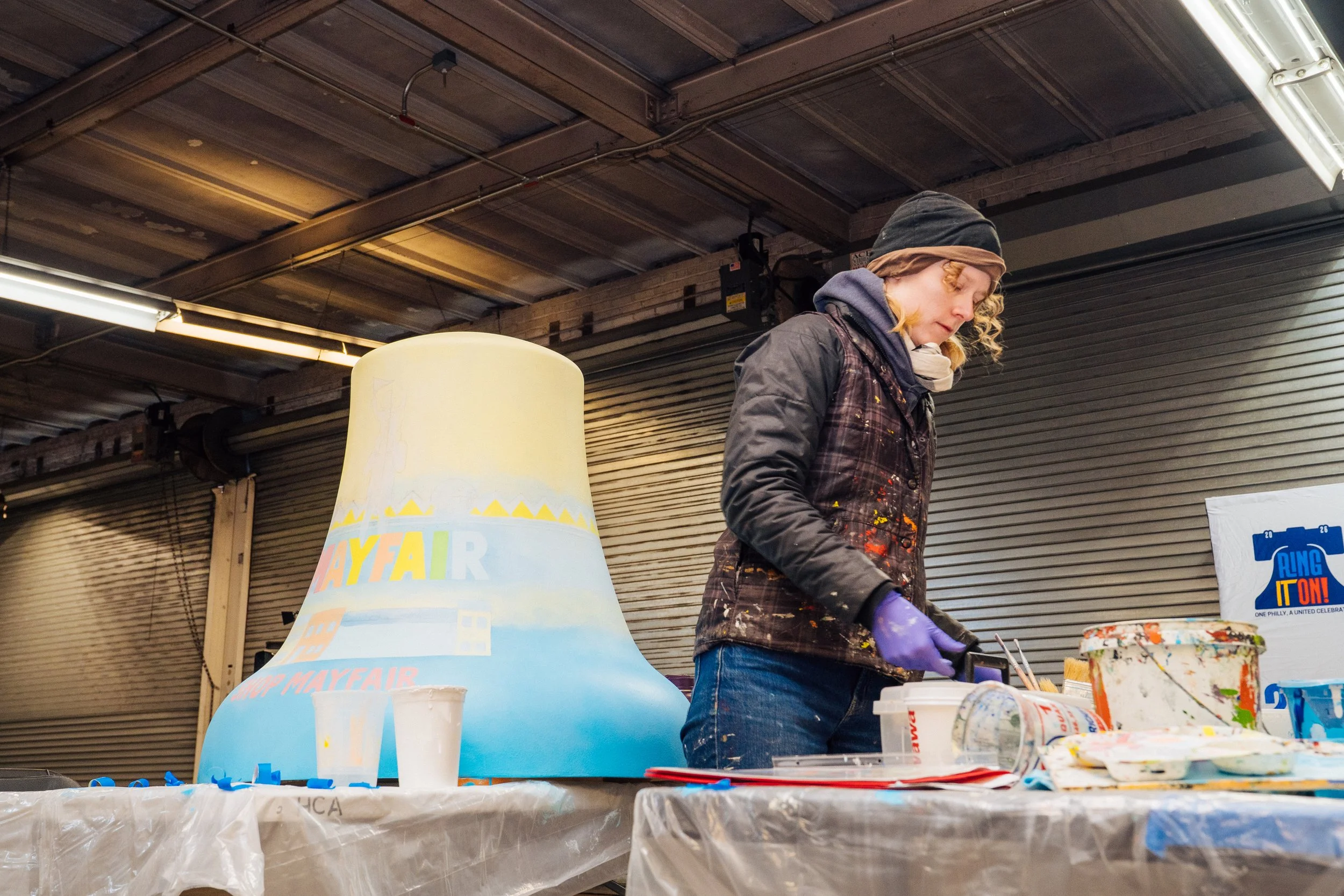 Process of painting bell, Photo Credit: Arekusn