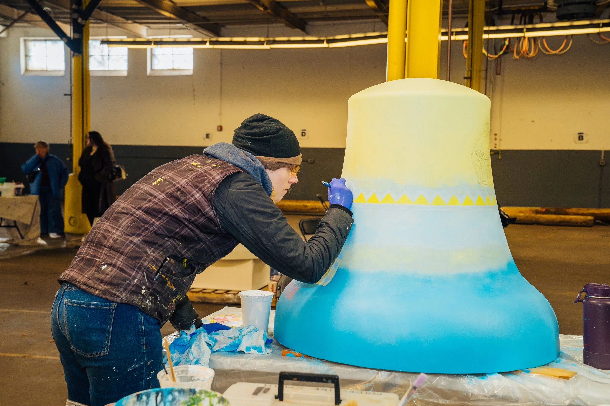 Process of painting bell, Photo Credit: Arekusn