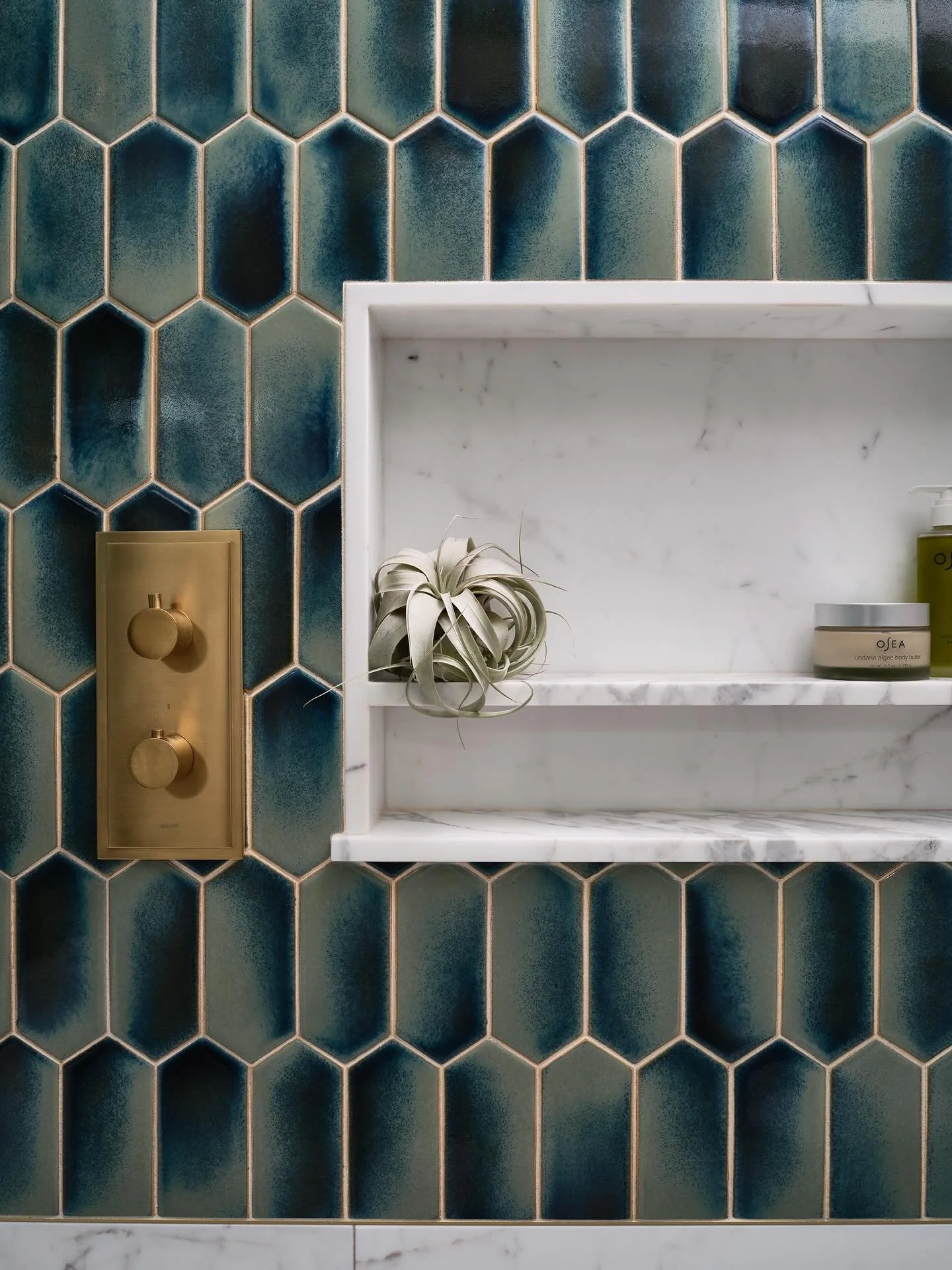 The kind of detail that makes everyday routines feel a little more special.

This started as a functional requirement, a place for shampoo, soap, the essentials. But those are the moments we pay the most attention to.

Layering tile with depth and va