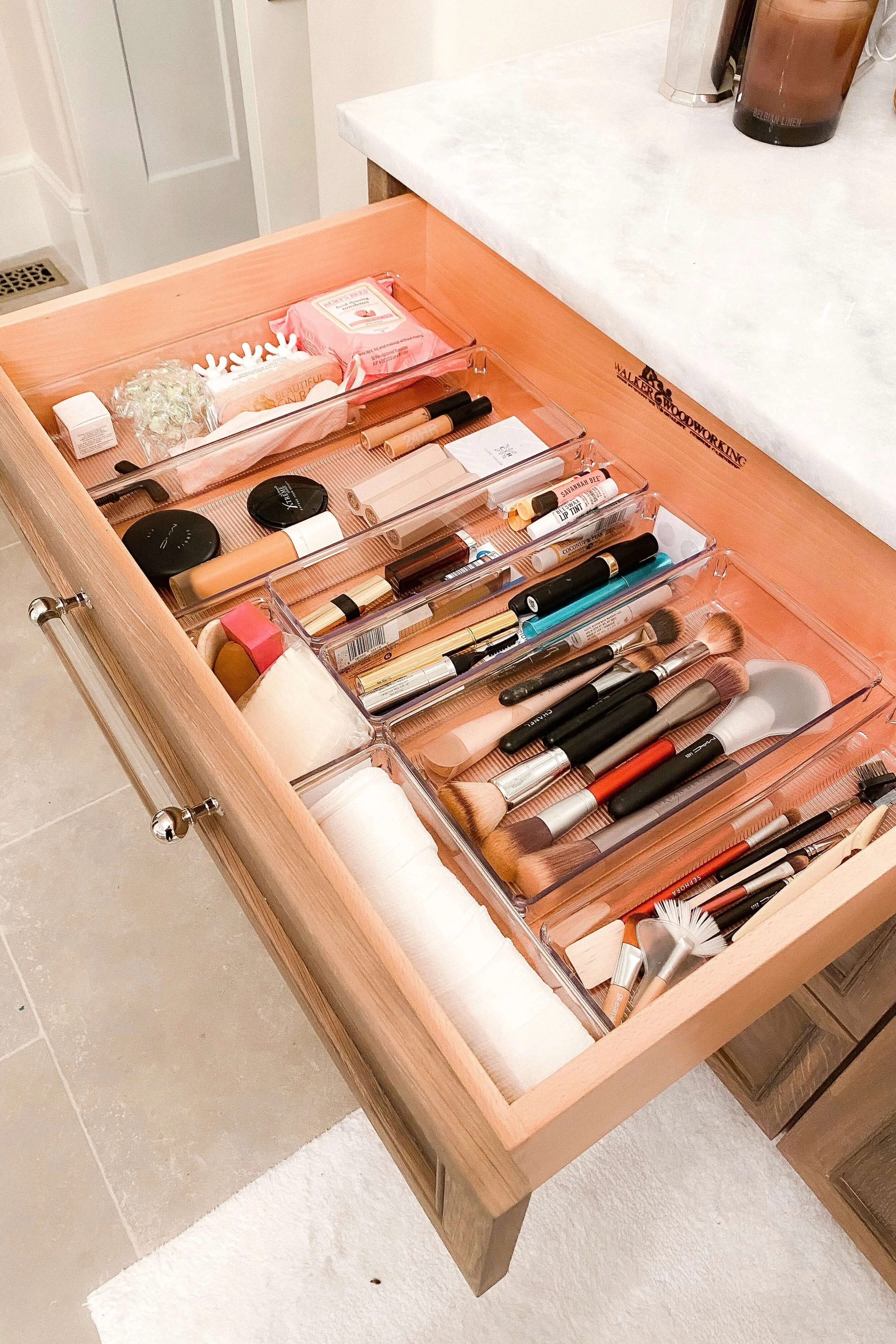 Professionally organized makeup drawer organized with drawer dividers