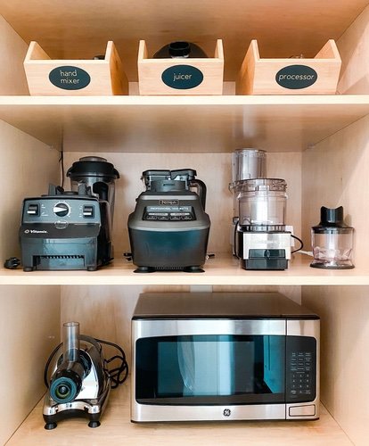 Kitchen appliances organized in a pantry