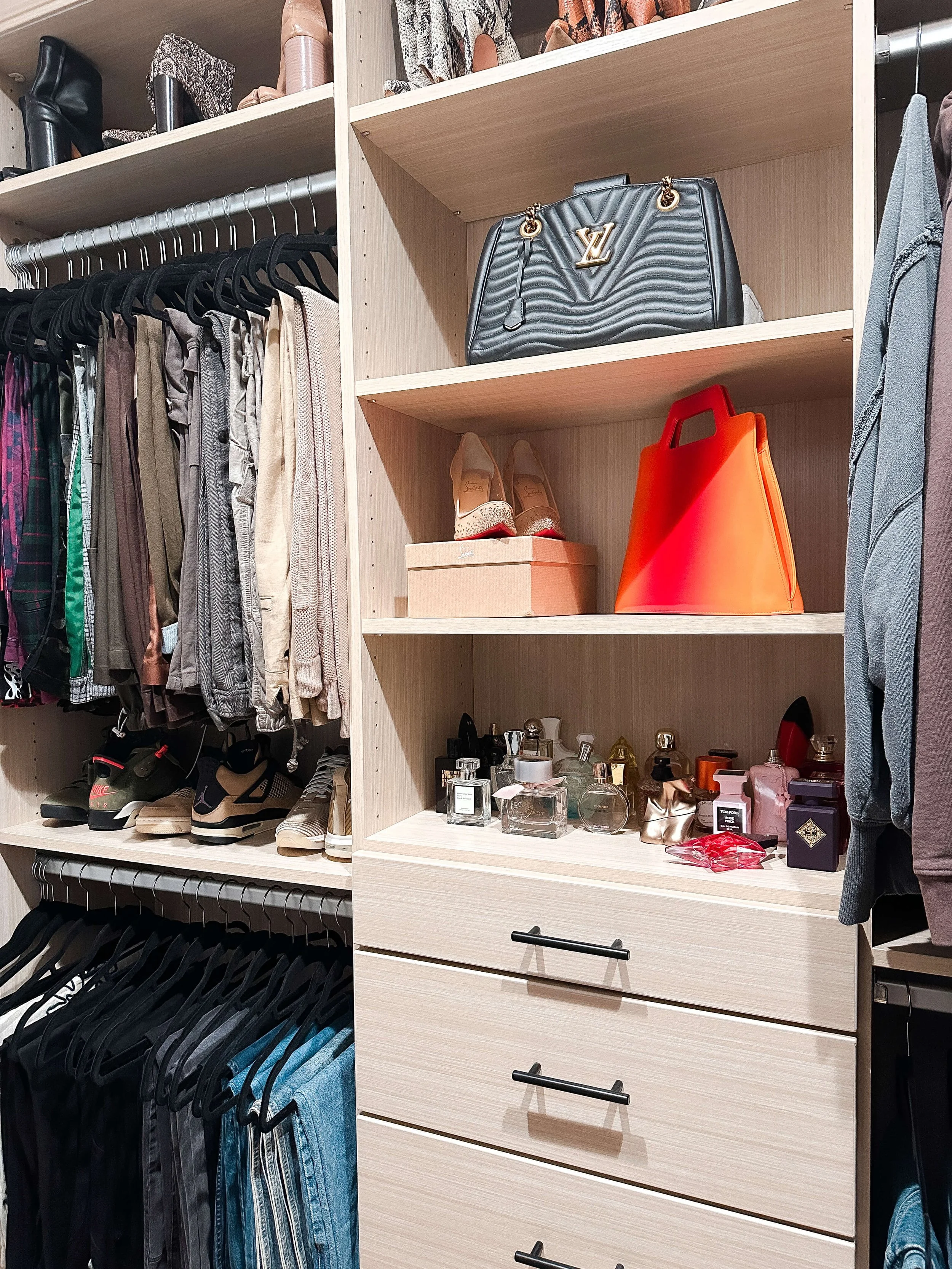 Closet fully unpacked and beautifully organized.
