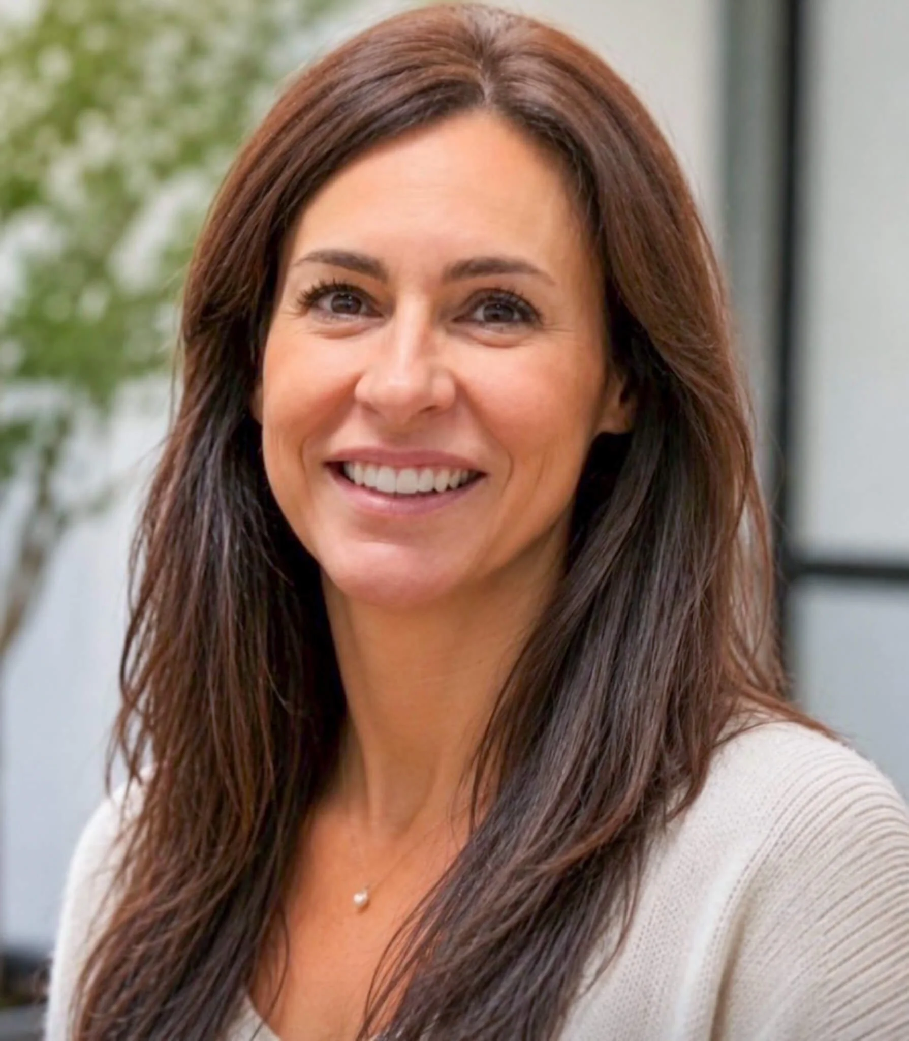 Headshot of professional organizer, Zsanett Critel from the Simplify Studio Charlotte, NC team