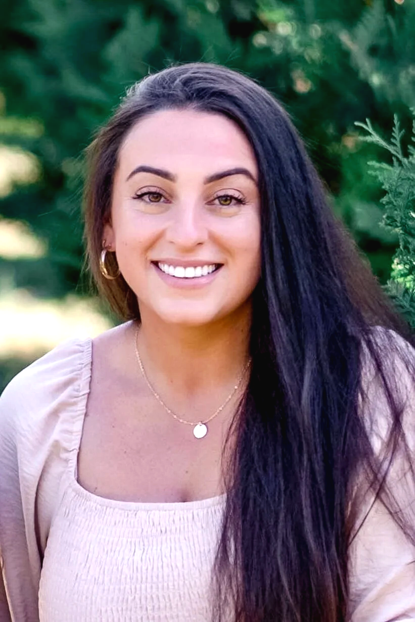 Headshot of professional organizer, Cambria Labrador, of Simplify Studio's Charlotte, NC organizing team