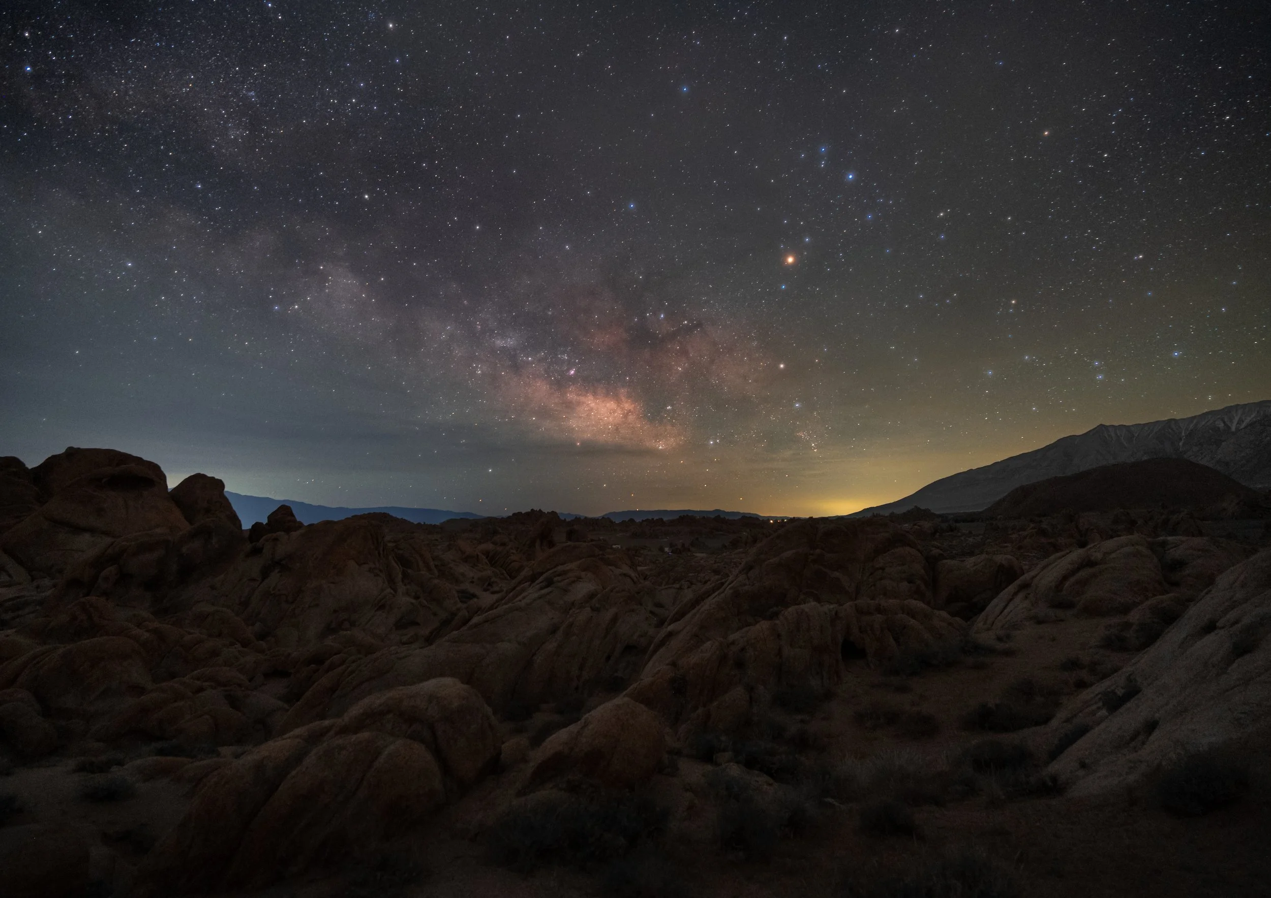 The Milky Way begins to rise over the Alabama Hills in California.  April, 2026
