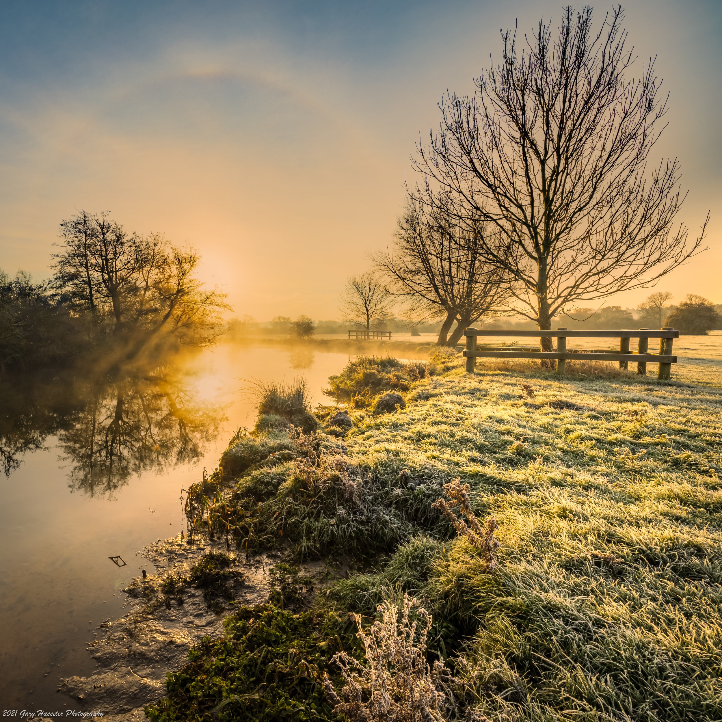 Winter light creates a sunbow above the Stour.