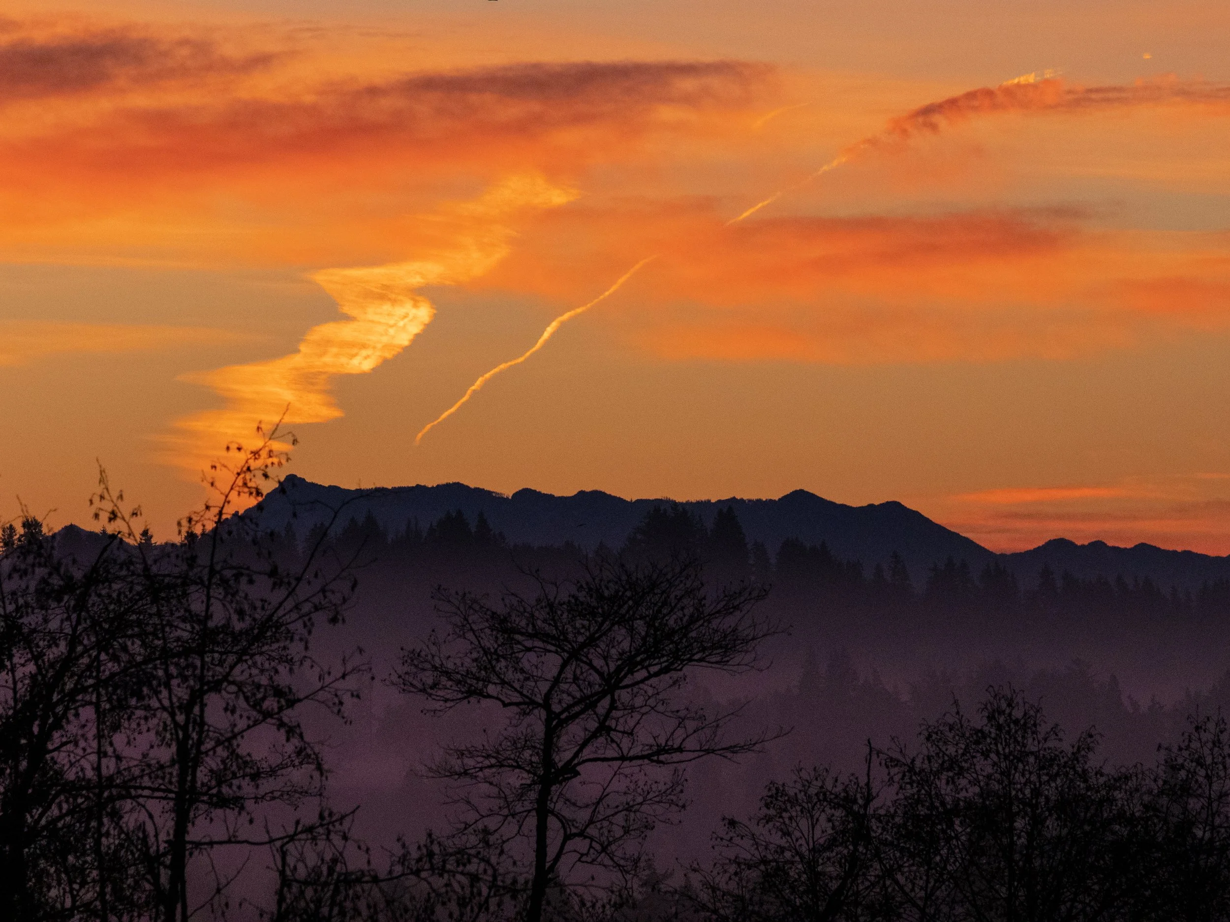 A fiery sunset colours the Cascade mountains in Washington state.
