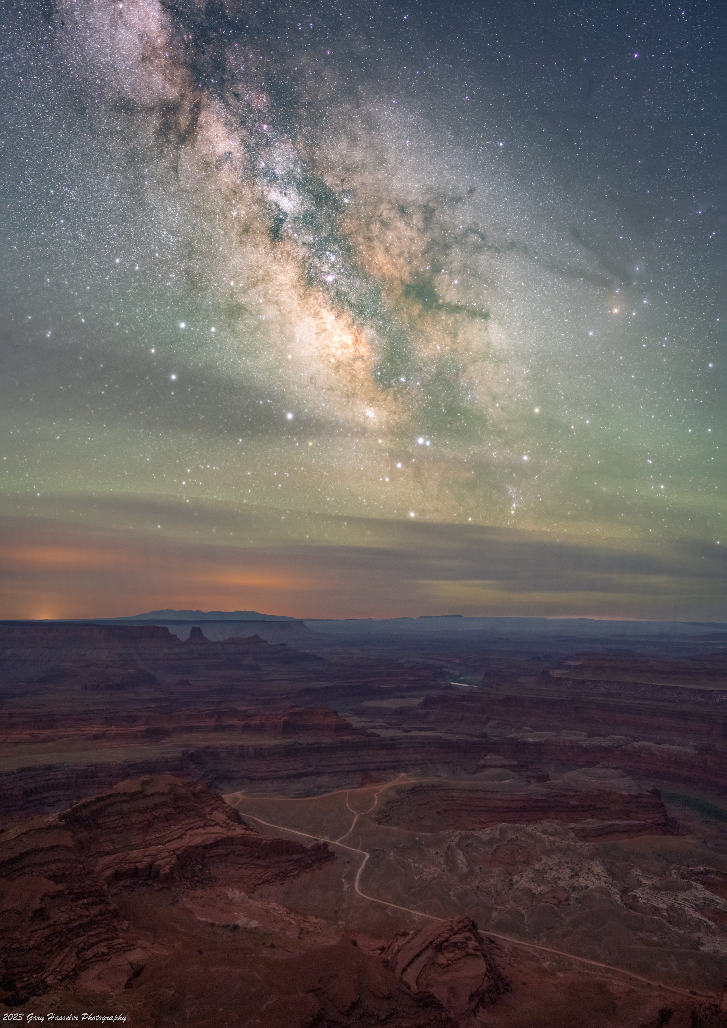 The Milky Way galactic core rising over Canyonlands National park in Utah. May.