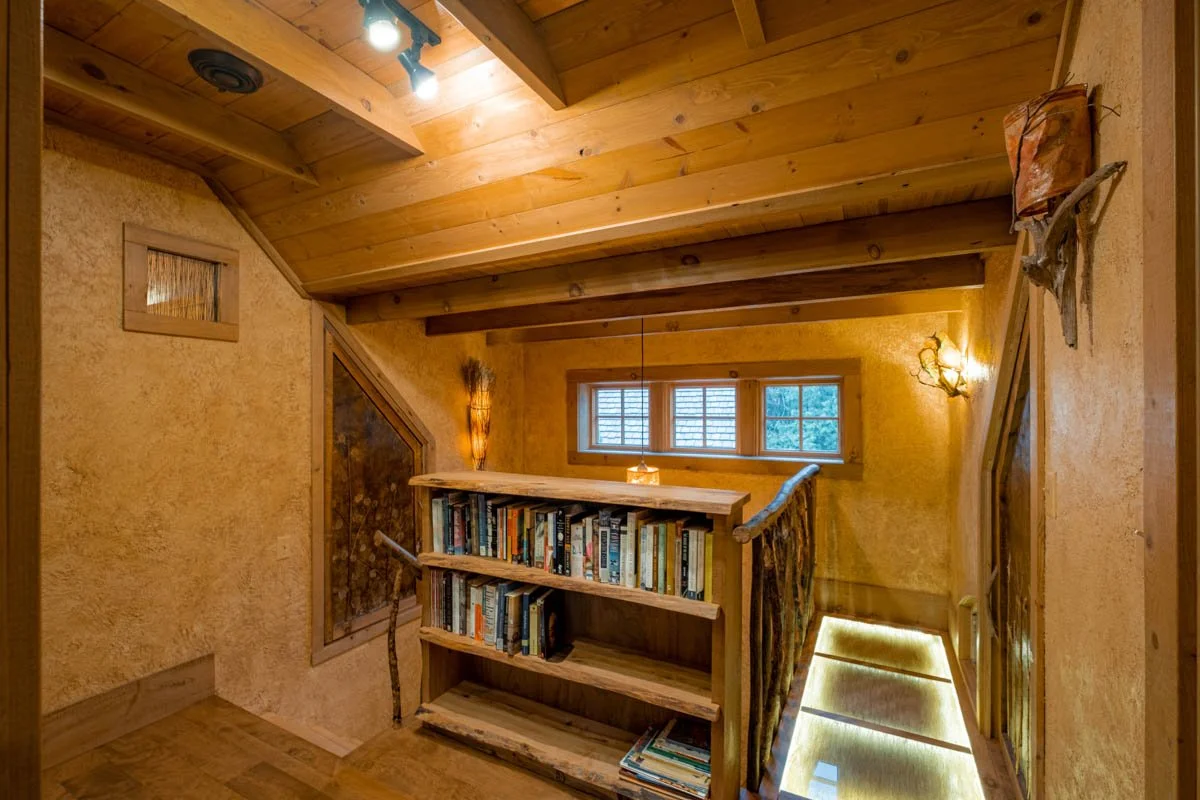 2nd floor, lighted glass skywalk provides access to kid's alcove.