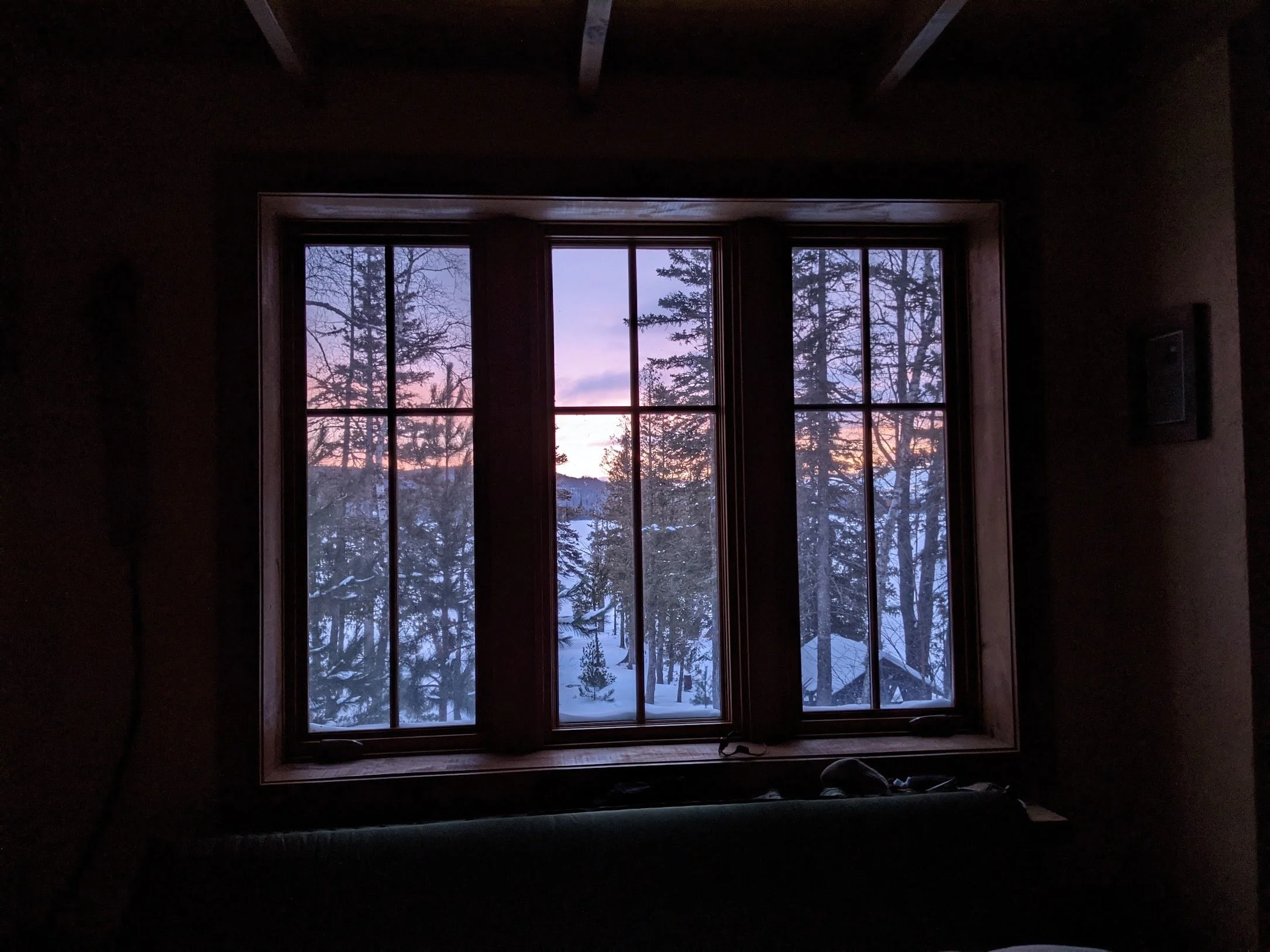 Morning sunrise through a bedroom window.