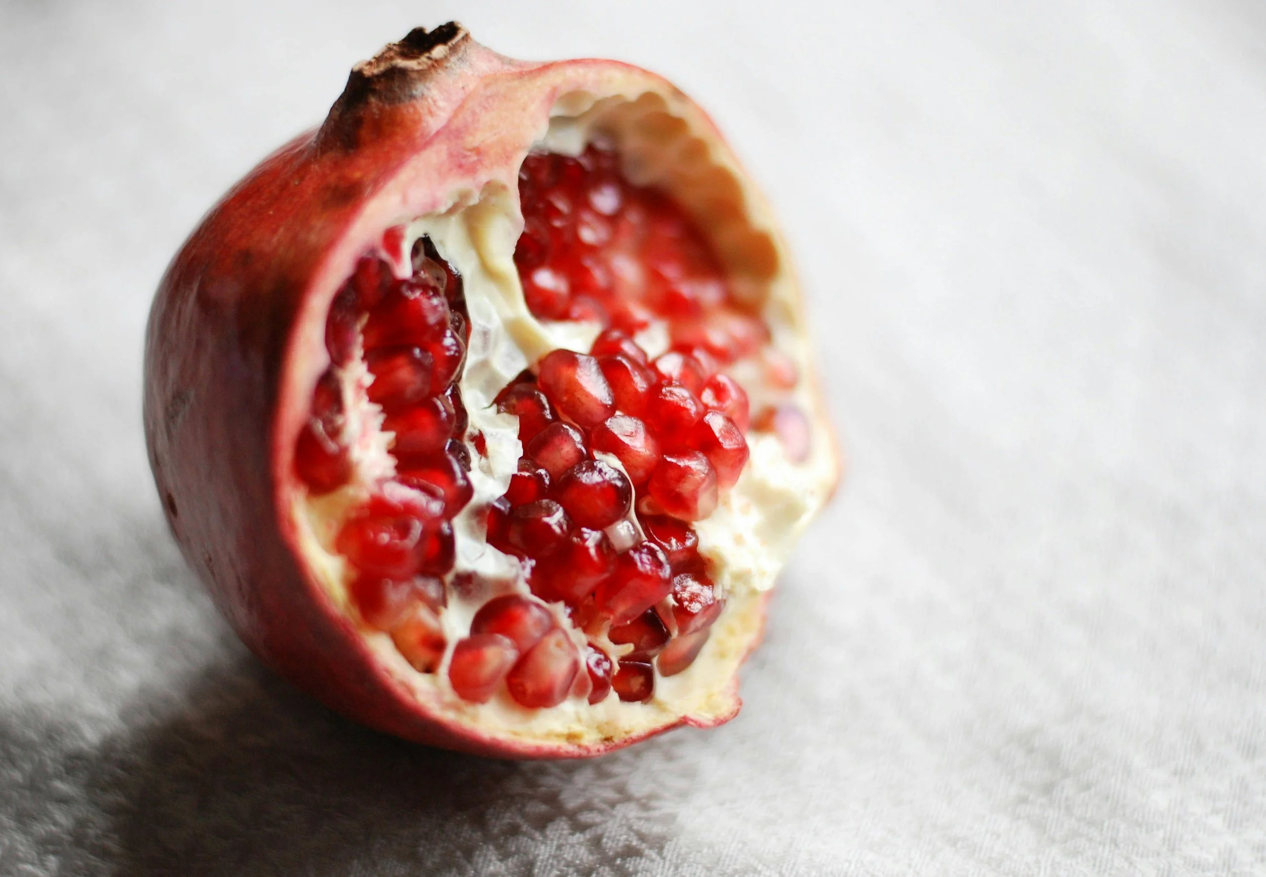 Image of a pomegranate as a symbol of fertility