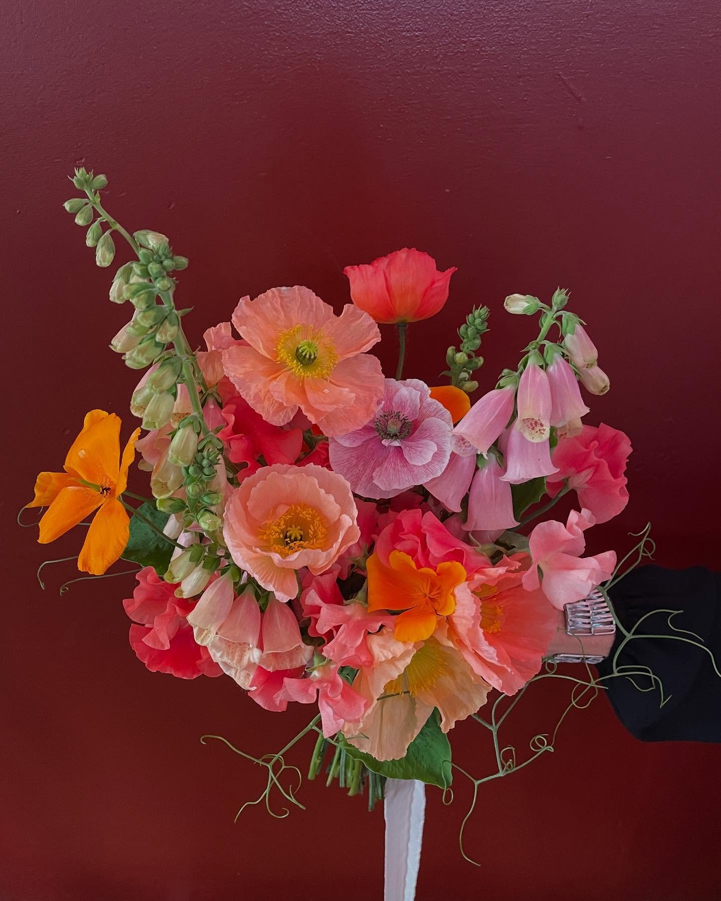 Bouquet of dreams for Caleigh last weekend; poppies, foxxies &amp; sweetpeas. Petals so delicate they look like they&rsquo;re made from crepe paper. Popping against that perfect rust backdrop that adorns the walls of The Round Chapel.

&bull;
&bull;
