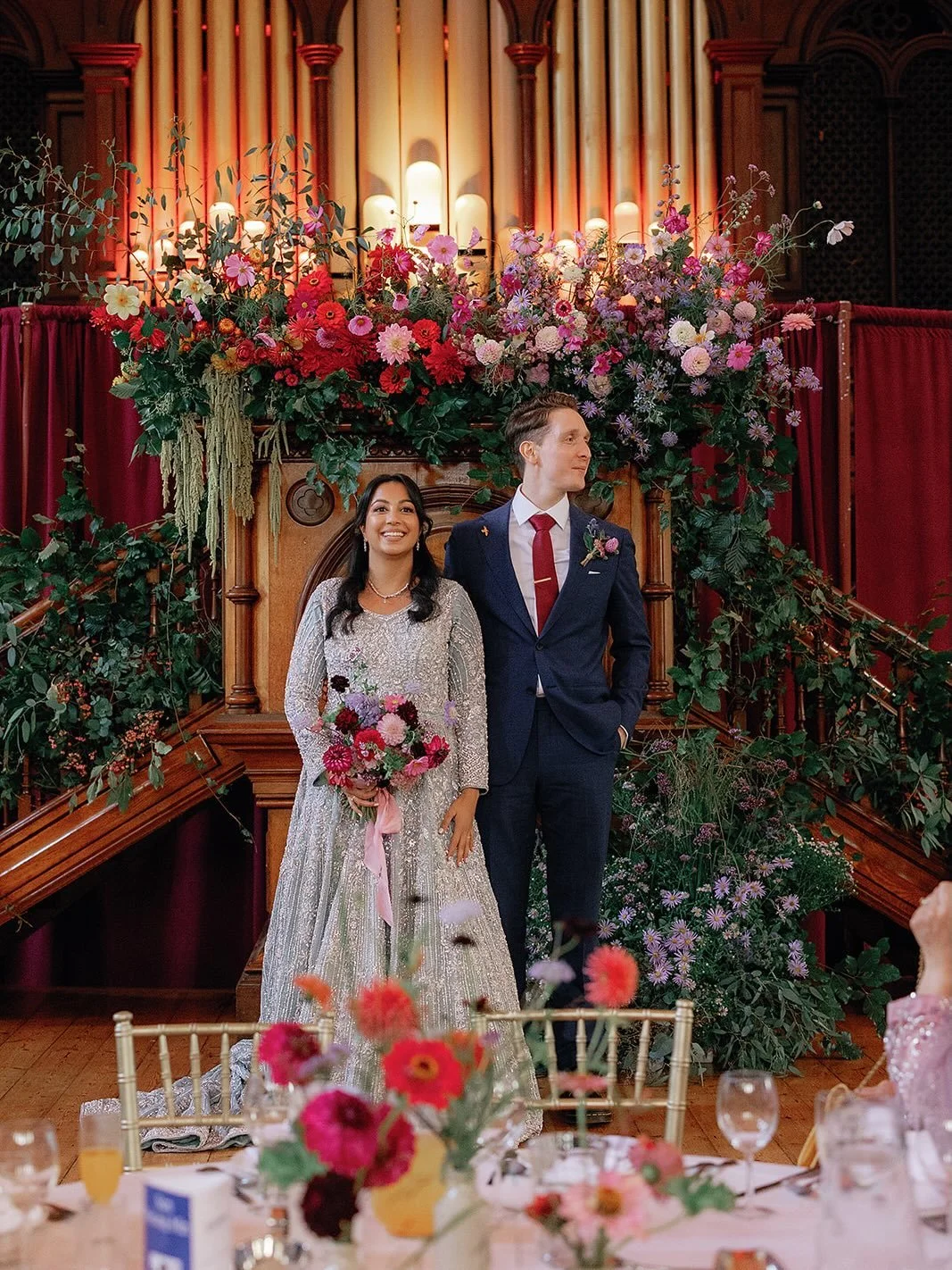 Make a statement with your wedding flowers! 
Z&amp;C wanted a big statement backdrop for their wedding speeches &amp; later on, the band and the dancefloor. 

They wanted something that felt colourful &amp; joyful to honour Z&rsquo;s Indian heritage,