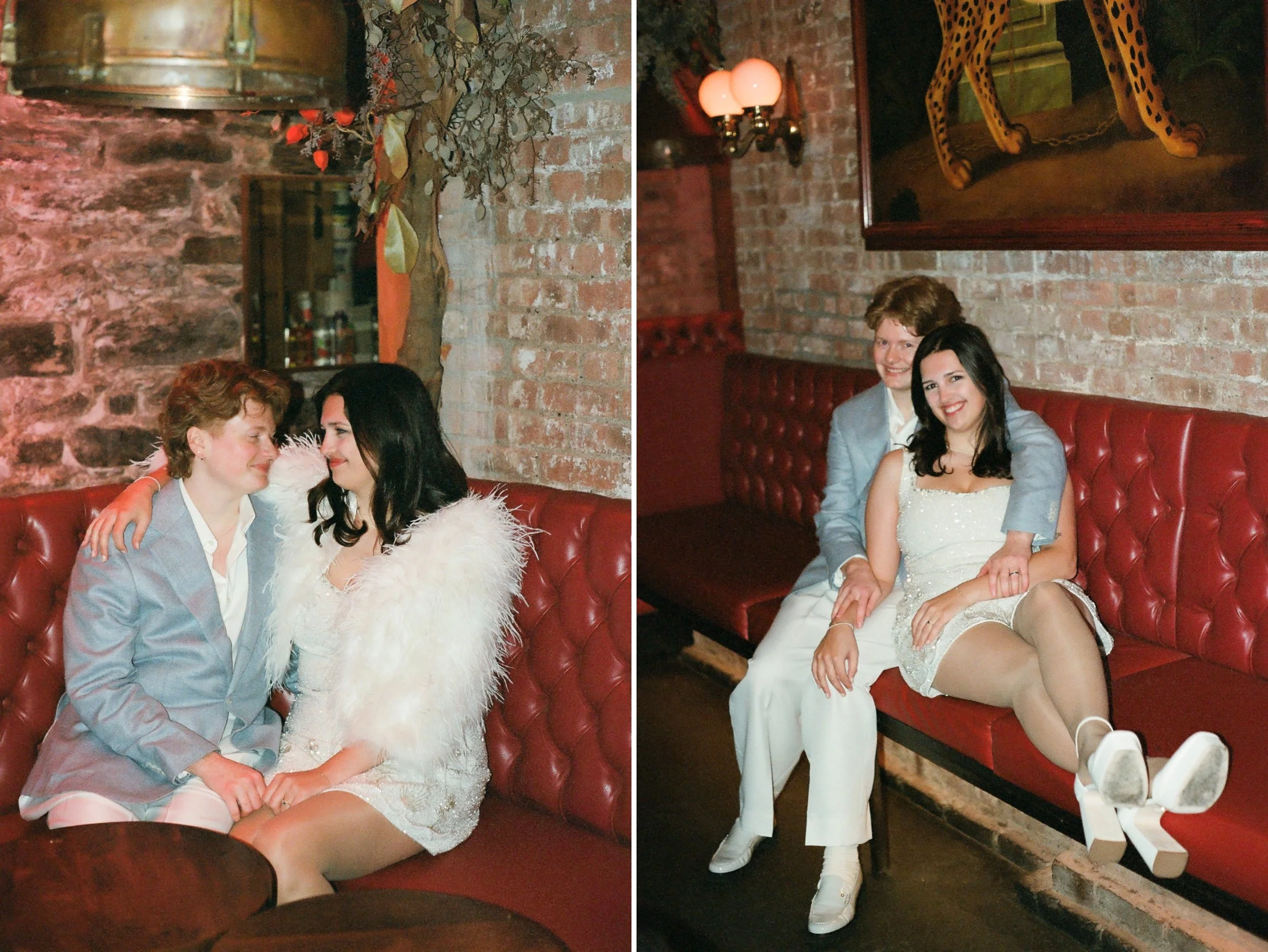 Couple sits on red booth at restaurant in little Italy