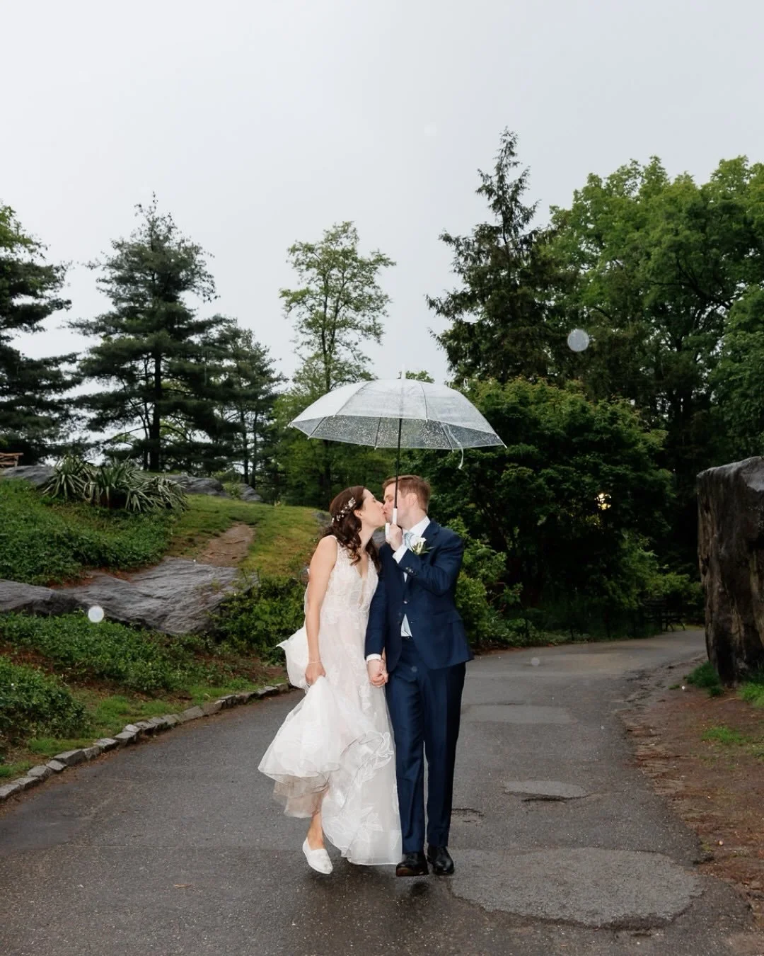 Sarah and Matt kicked off their wedding day by inviting all of their 40 guests to a live Peloton class with one of their favorite instructors. They then had a beautiful intimate wedding with a romantic rainy ceremony in Central Park followed by an am