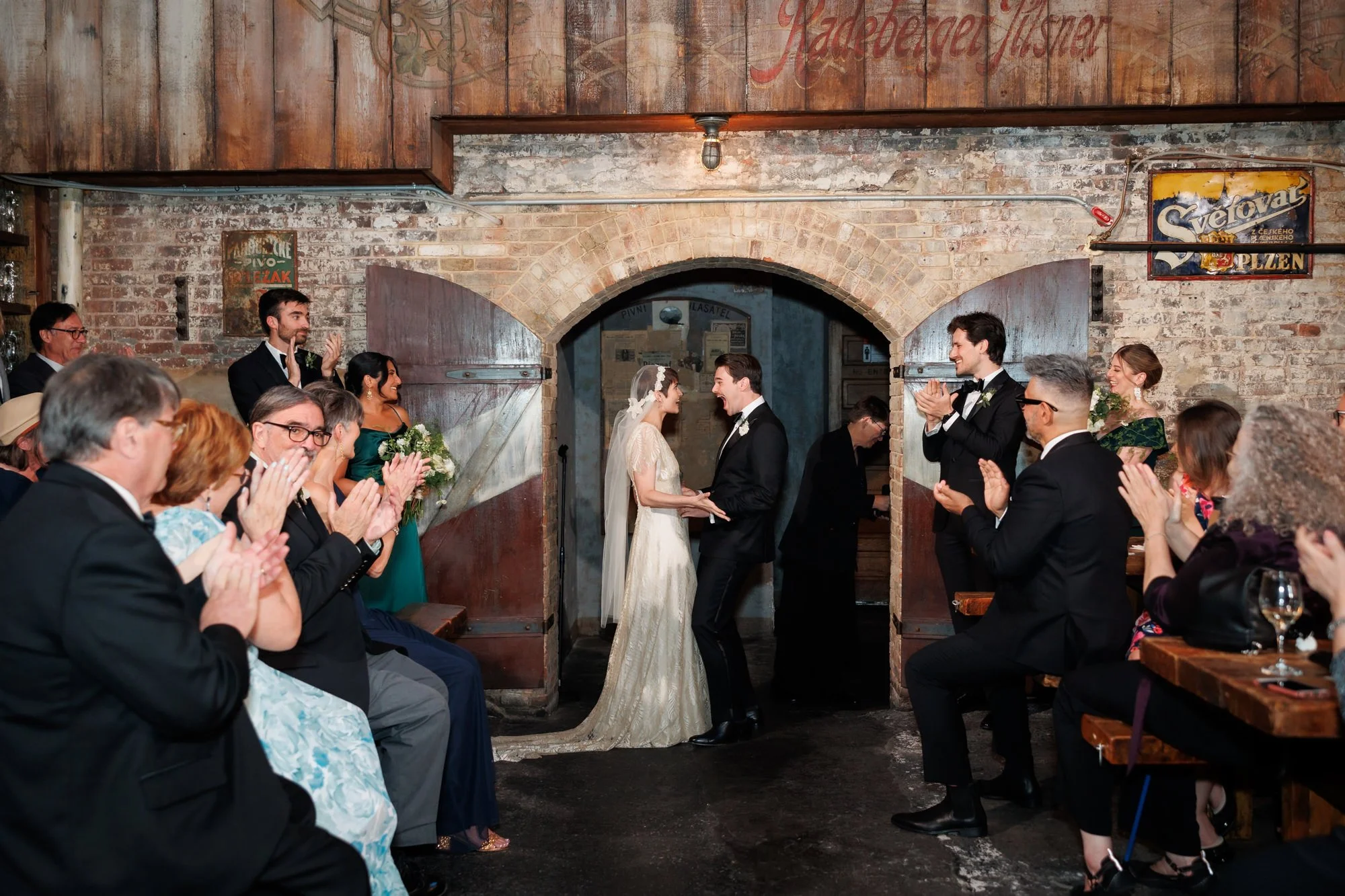 Newlyweds celebrating during their wedding ceremony 