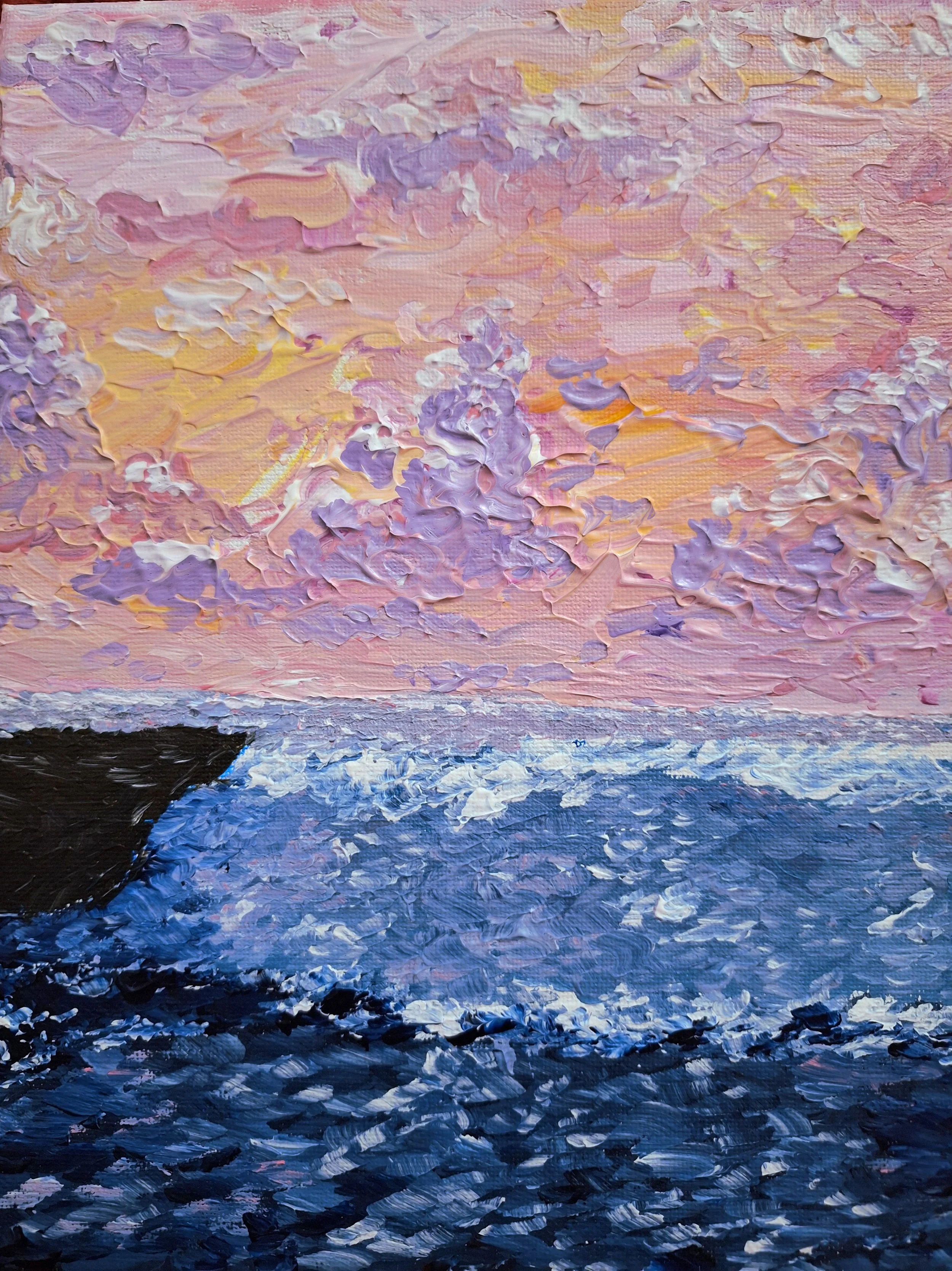 Impressionist painting of a sunset over the ocean with a rocky cliff on the left and pink, purple, and orange clouds in the sky.