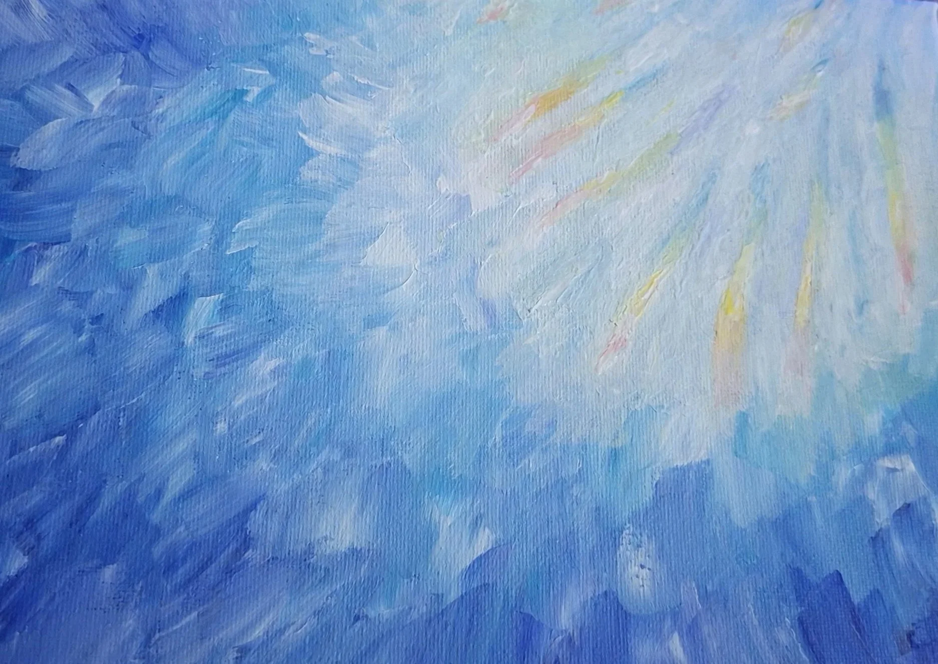 Abstract watercolor painting with shades of blue, with hints of yellow, pink, and purple, creating a soft and textured appearance.