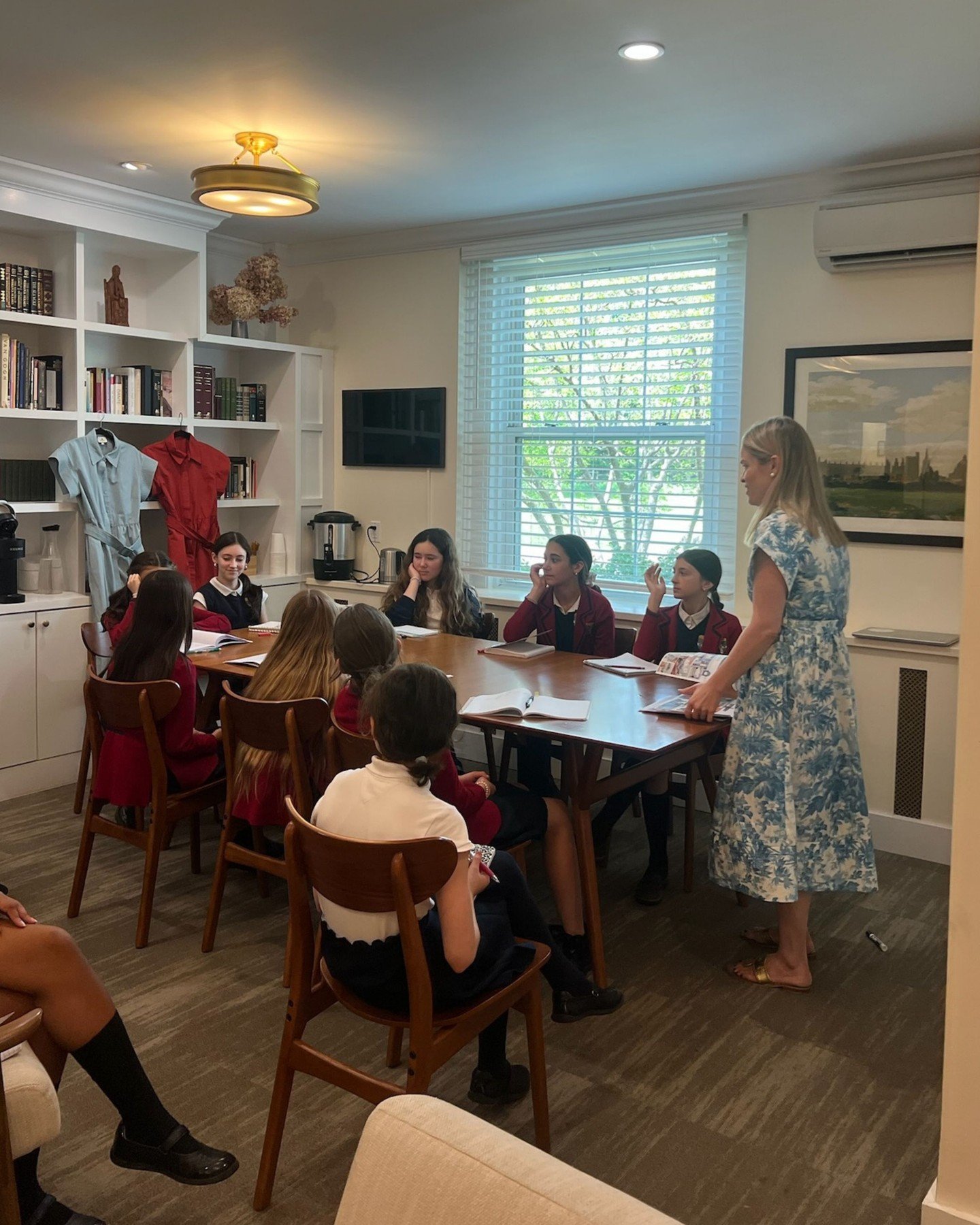 The middle school girls have been meeting with working women to learn more about their jobs, and I was lucky enough to lead one session about merchandising and marketing. Their questions were tough!
