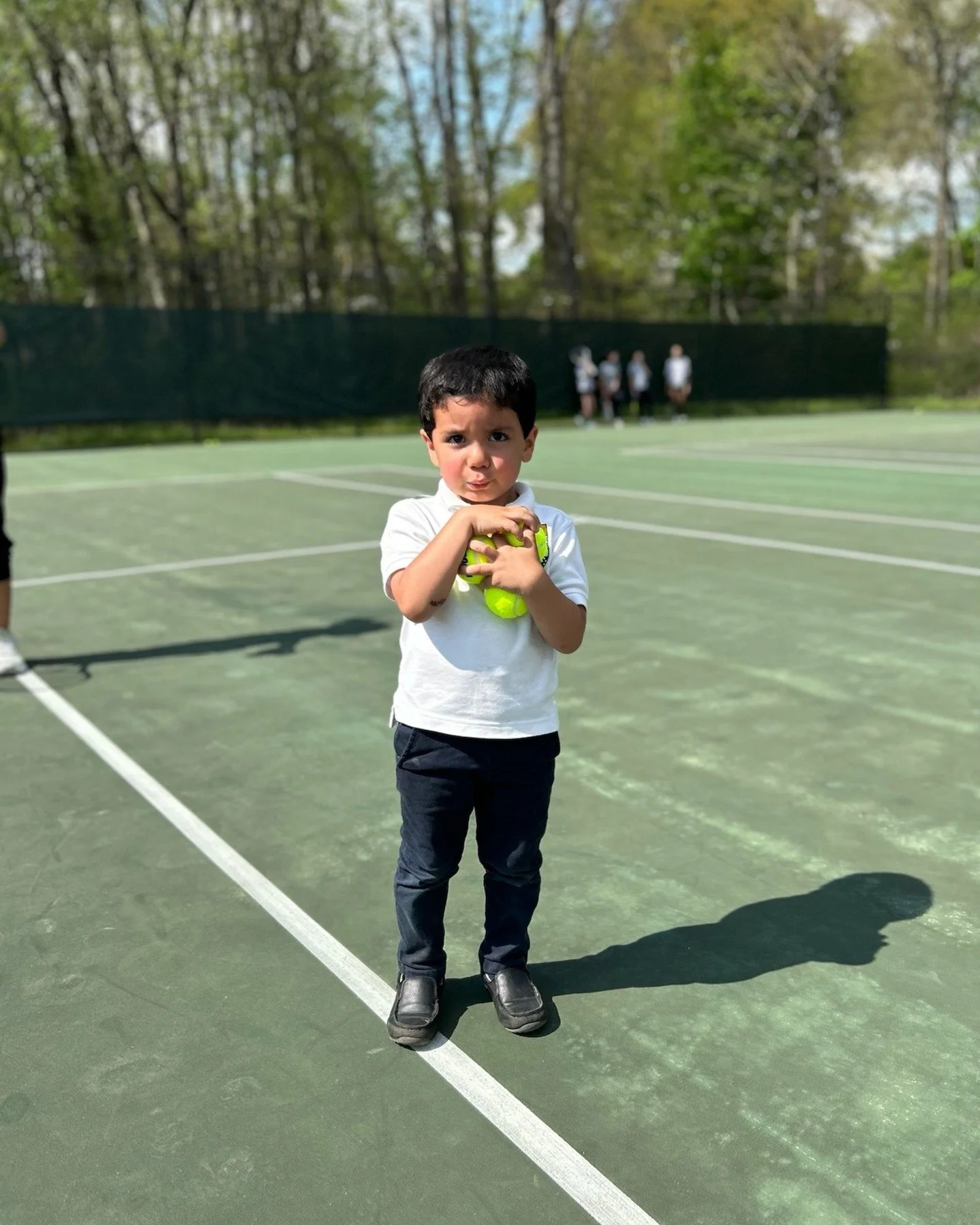 Of all the players on the Hawthorn tennis team, this ball boy might be the sweetest.